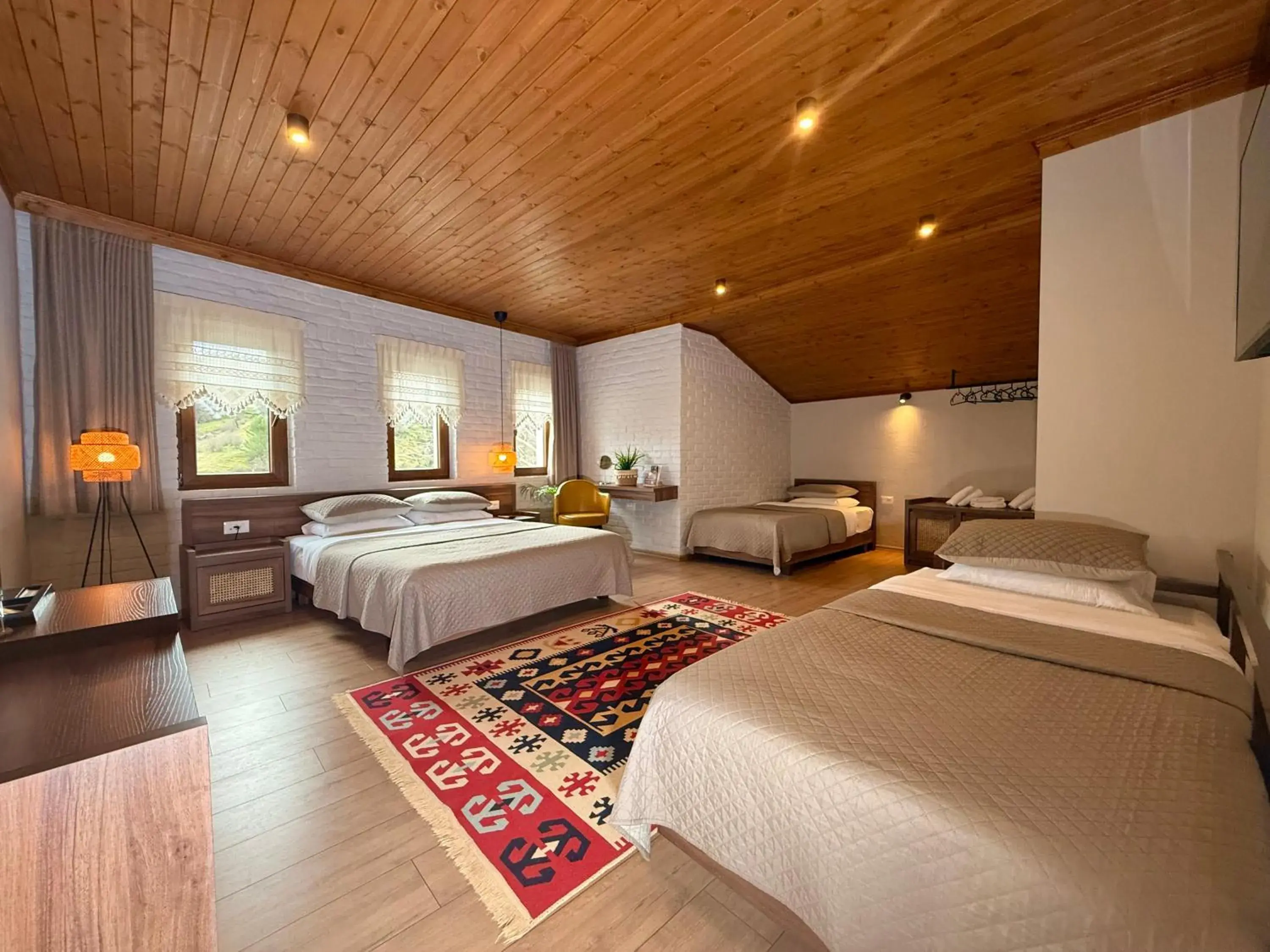 Deluxe Quadruple Room in The Stone Sky Hotel Deluxe Quadruple Room in The Stone Sky Hotel