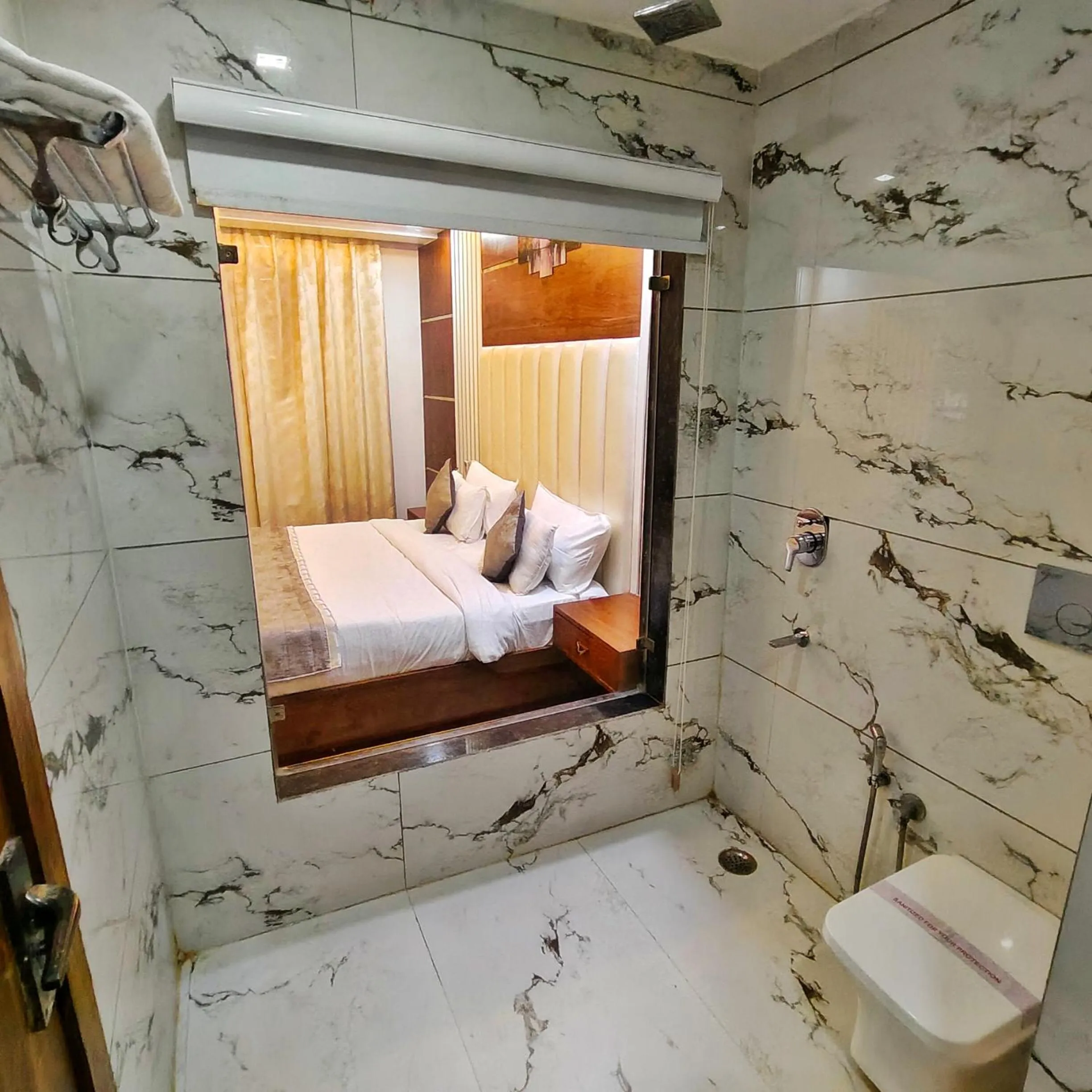 Bathroom, Bed in Rich Grand Hotel