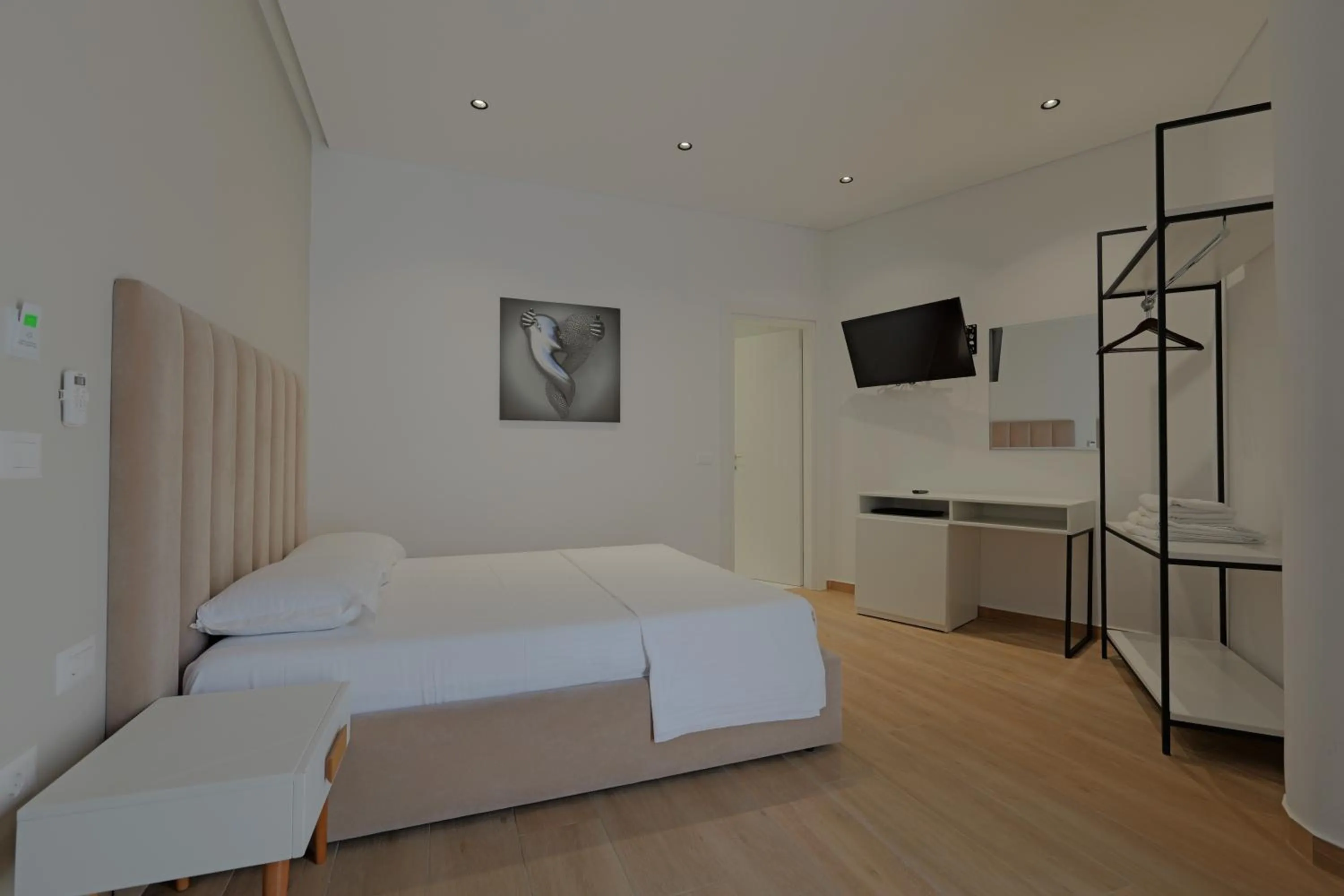 Communal lounge/ TV room, Bed in Sea & Sand Hotel