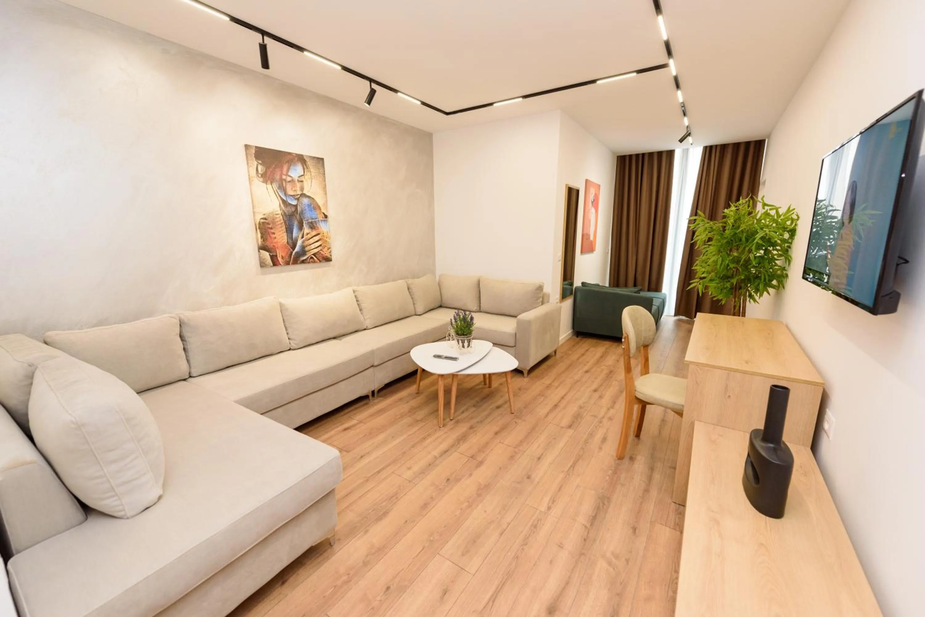 Communal lounge/ TV room in Sea & Sand Hotel