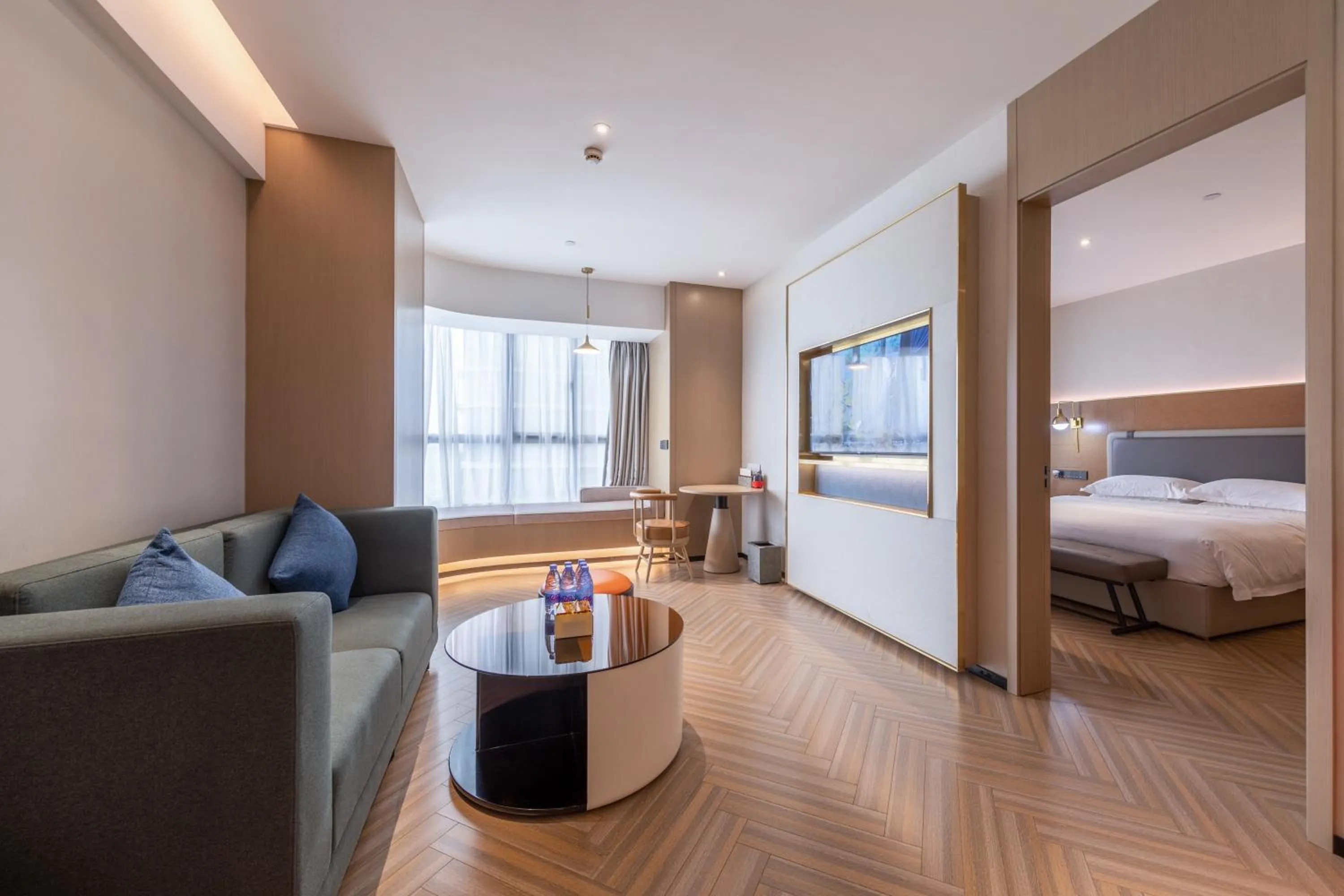 Living room, Bed in Guangzhou Baiyun Airport MeHood Liz Hotel Free Shuttle Bus to Airport
