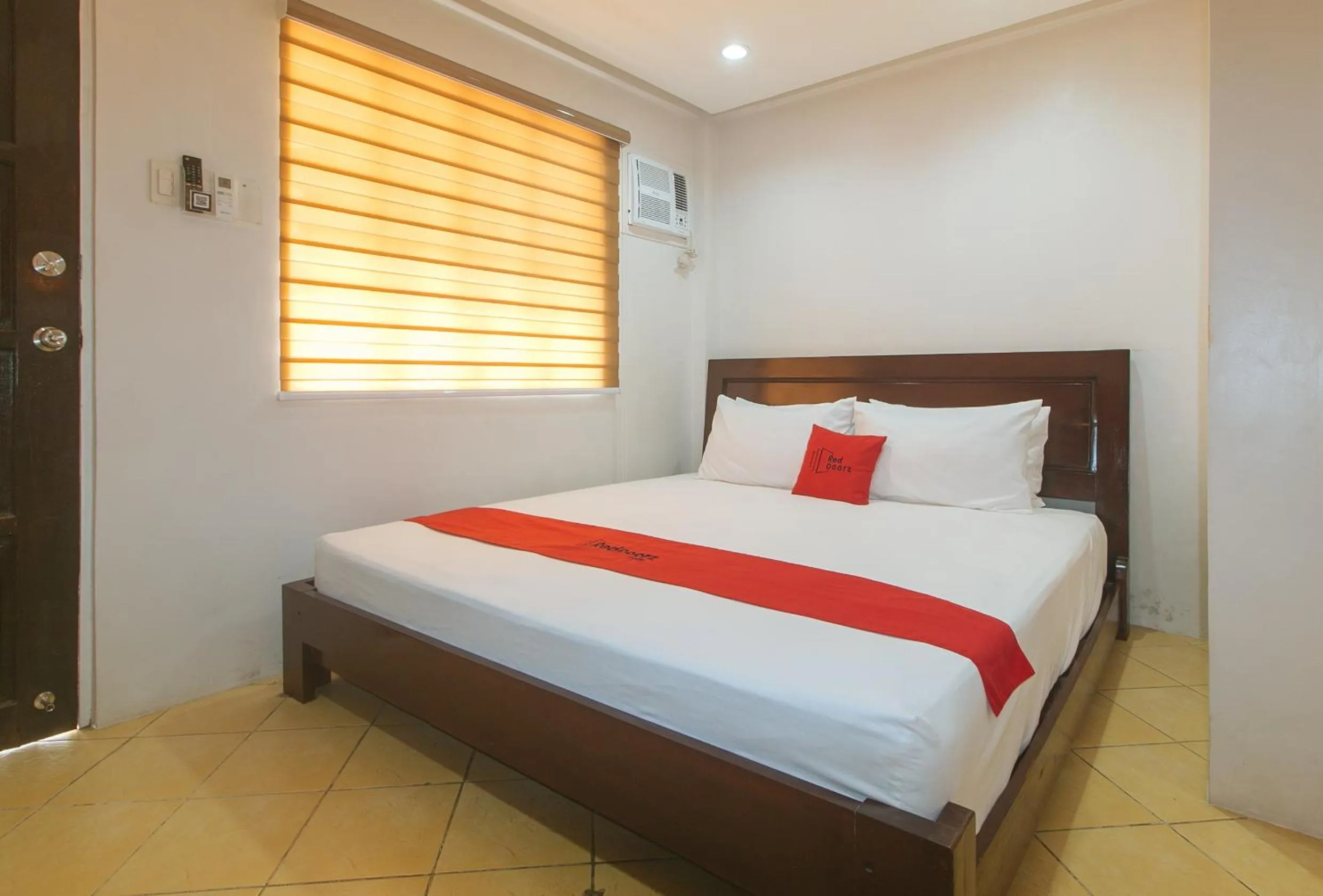 Bedroom, Bed in RedDoorz at Davids Travellers Inn Cavite