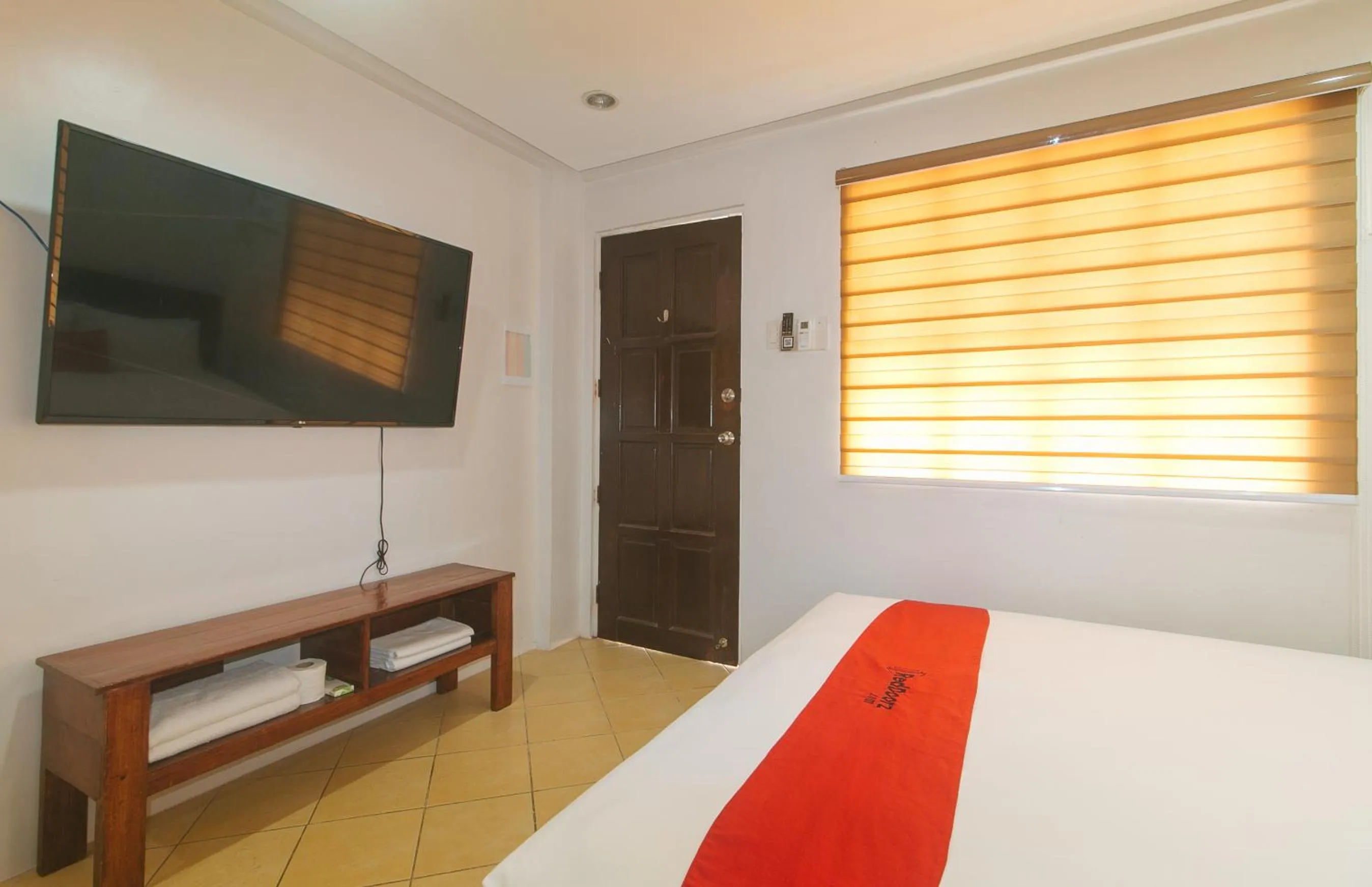 Bed in RedDoorz at Davids Travellers Inn Cavite