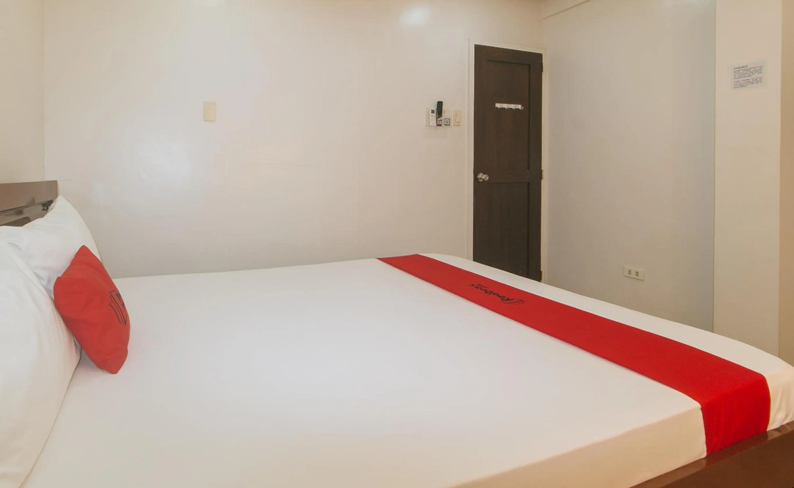 Bed in RedDoorz at Davids Travellers Inn Cavite