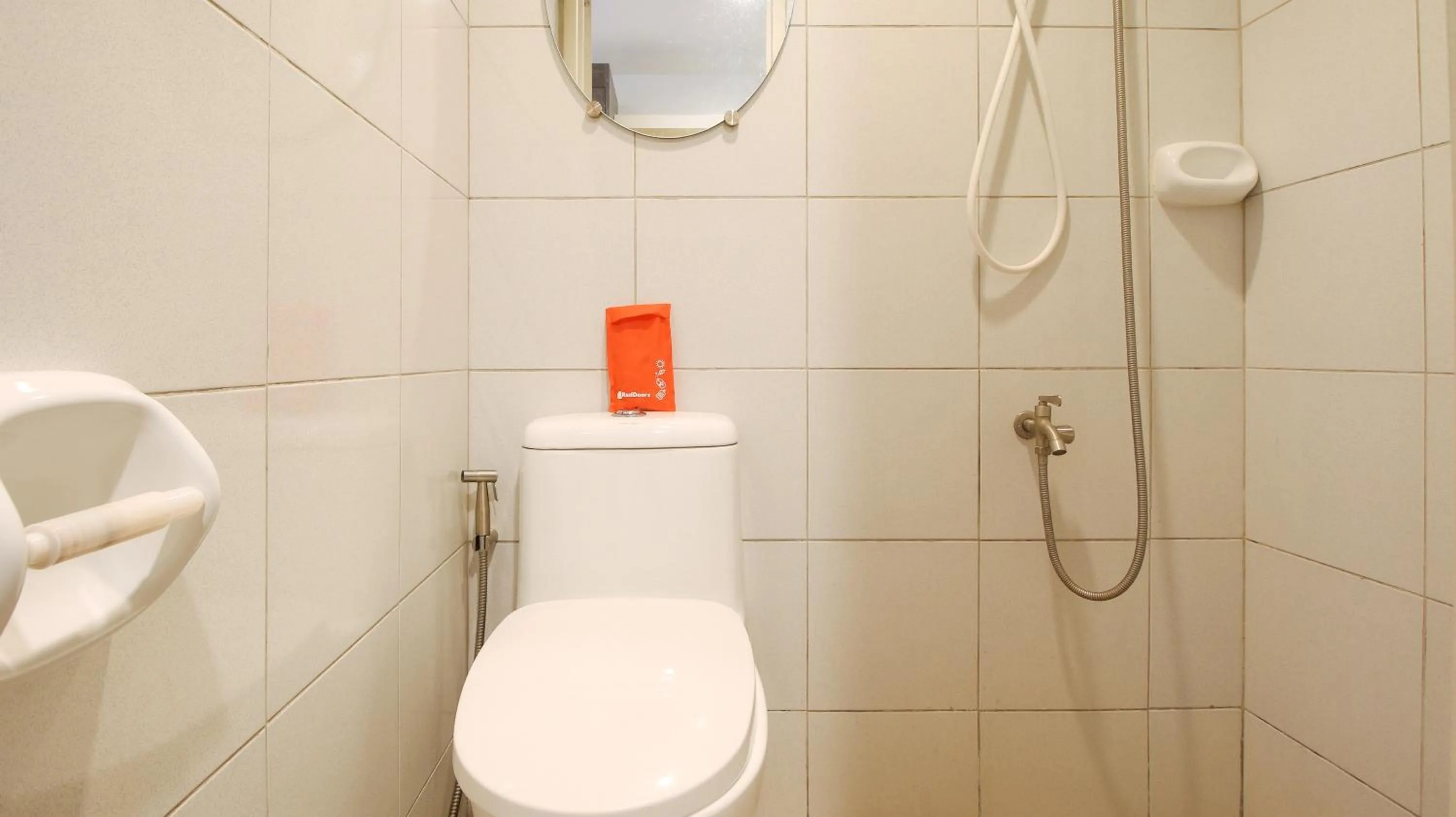 Toilet in RedDoorz at David's Travellers Inn Cavite