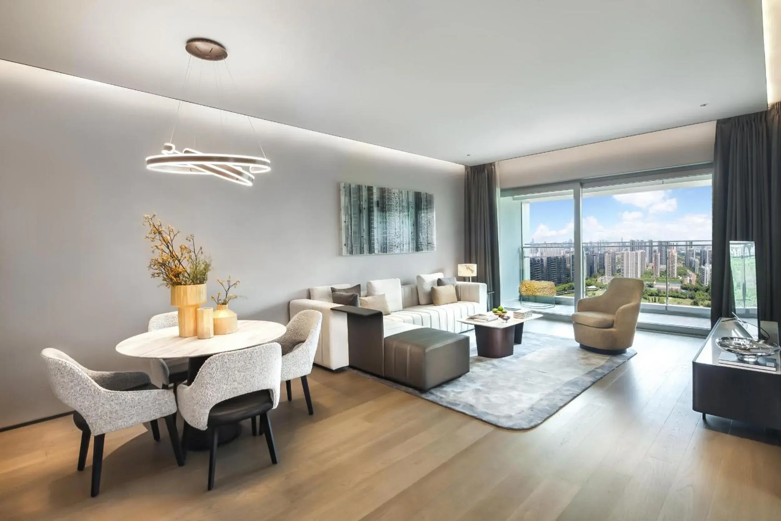 Living room in Artisse Place - Access to 4000 sqm Fusion Wellness Centre and 800 sqm Indoor Swimming Pool Living room in Artisse Place - Access to 4000 sqm Fusion Wellness Centre and 800 sqm Indoor Swimming Pool