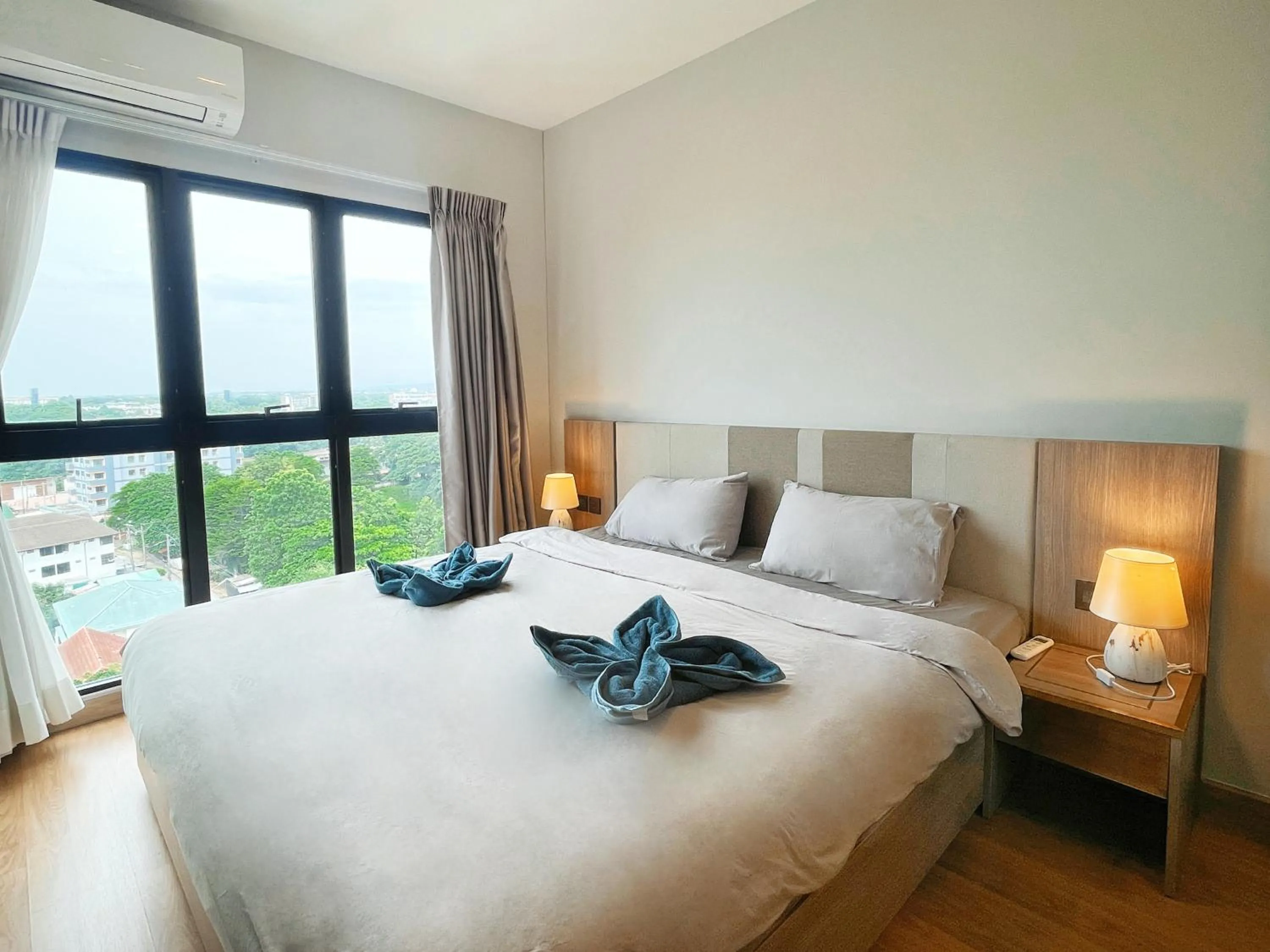 Bed in Astra Sky River Paronama Pool Luxury Changklan Chiang Mai