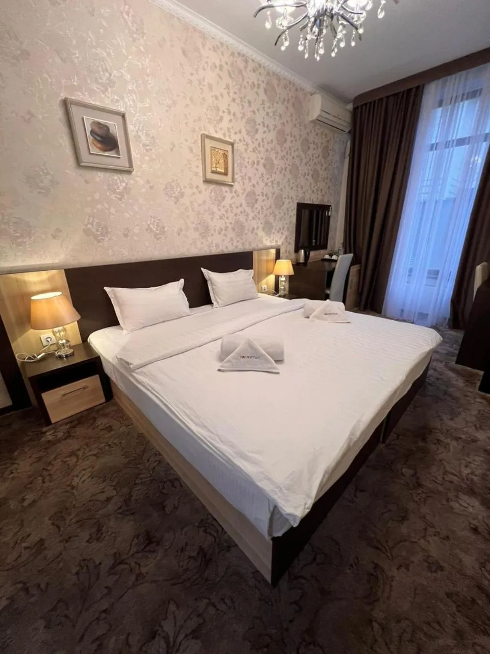 Bed in Hotel Touristan Bishkek