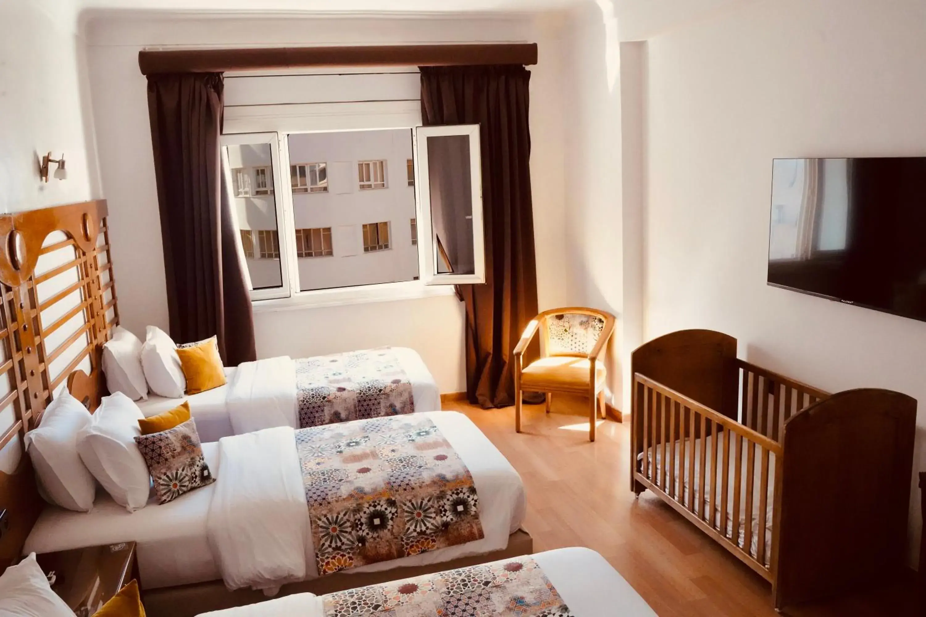 Bed in Hôtel Rembrandt Bed in Hôtel Rembrandt