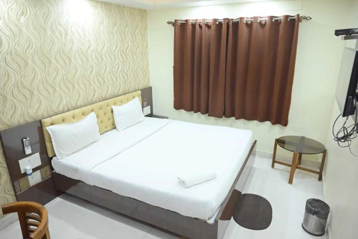 Bedroom in Hotel Jyoti International