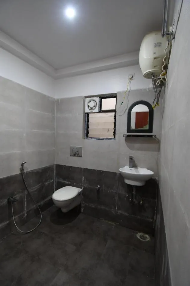 Bathroom in Hotel Jyoti International