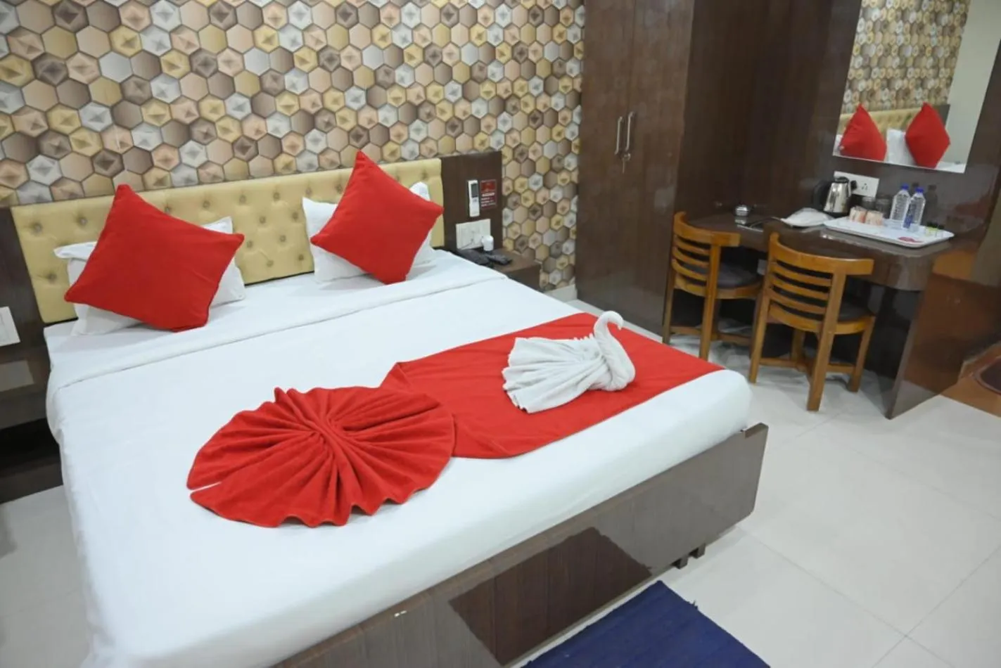 Bed in Hotel Jyoti International