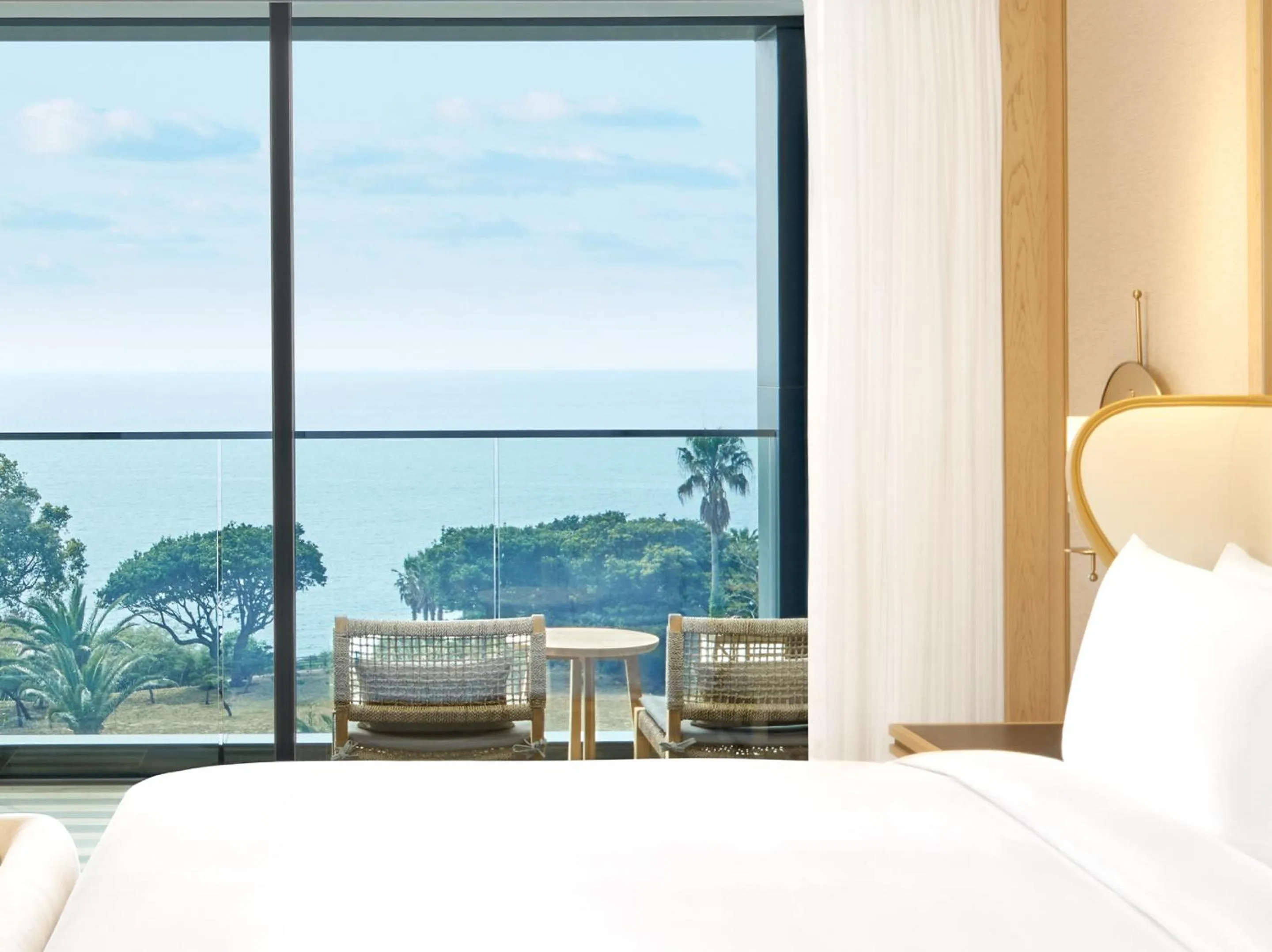 Sea view, Bed in JW Marriott Jeju Resort & Spa