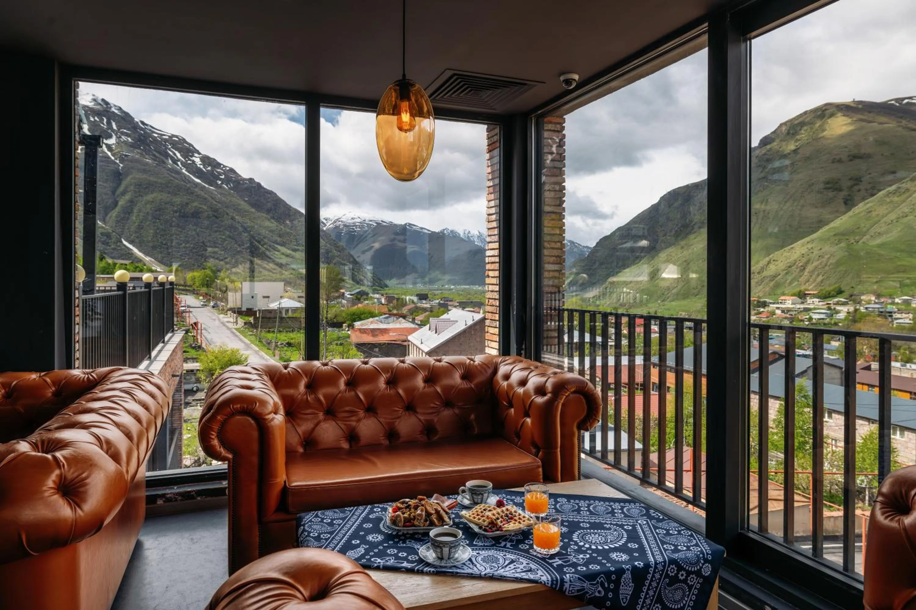 Seating area in Hotel Memoir Kazbegi by DNT Group