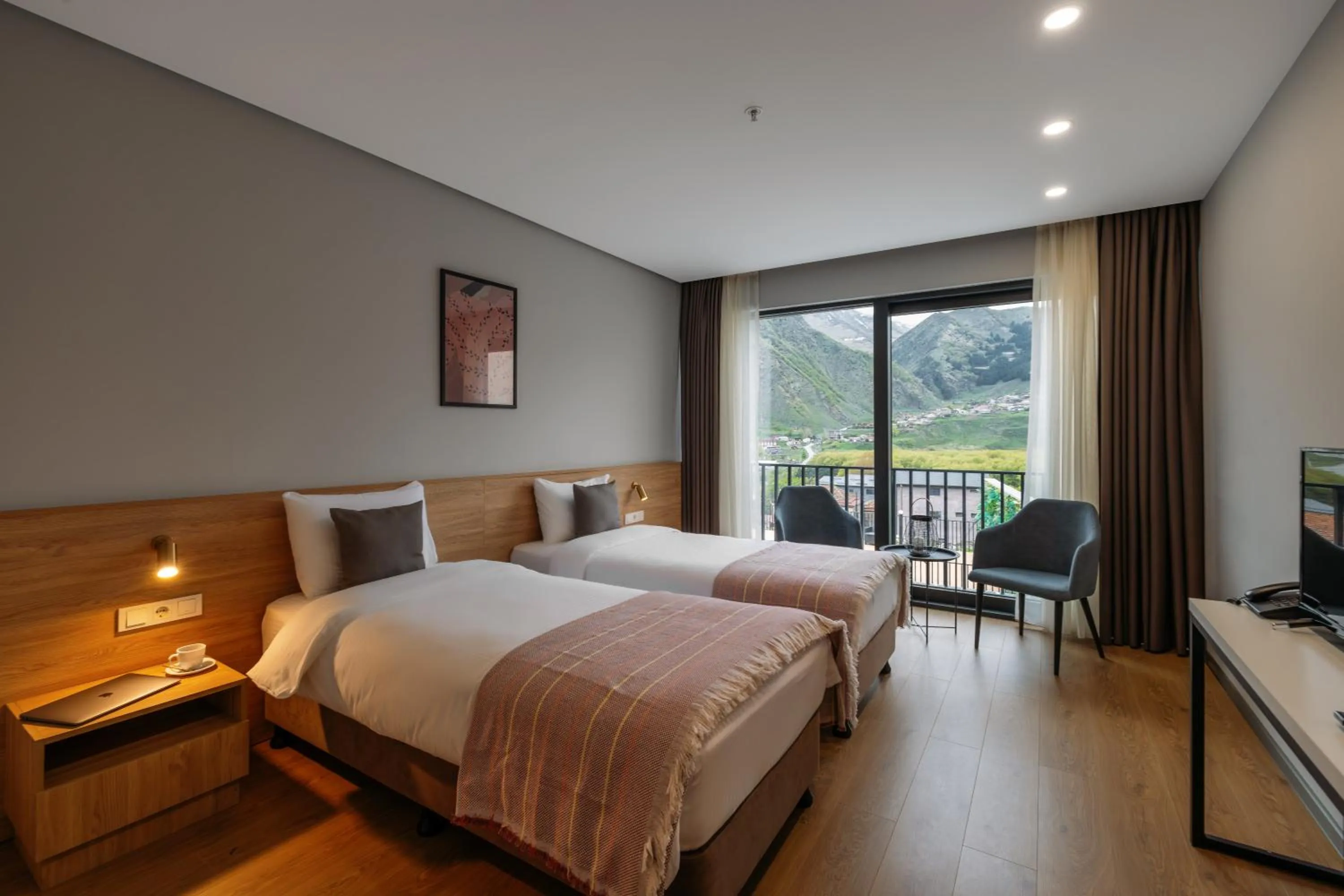Bed in Hotel Memoir Kazbegi by DNT Group