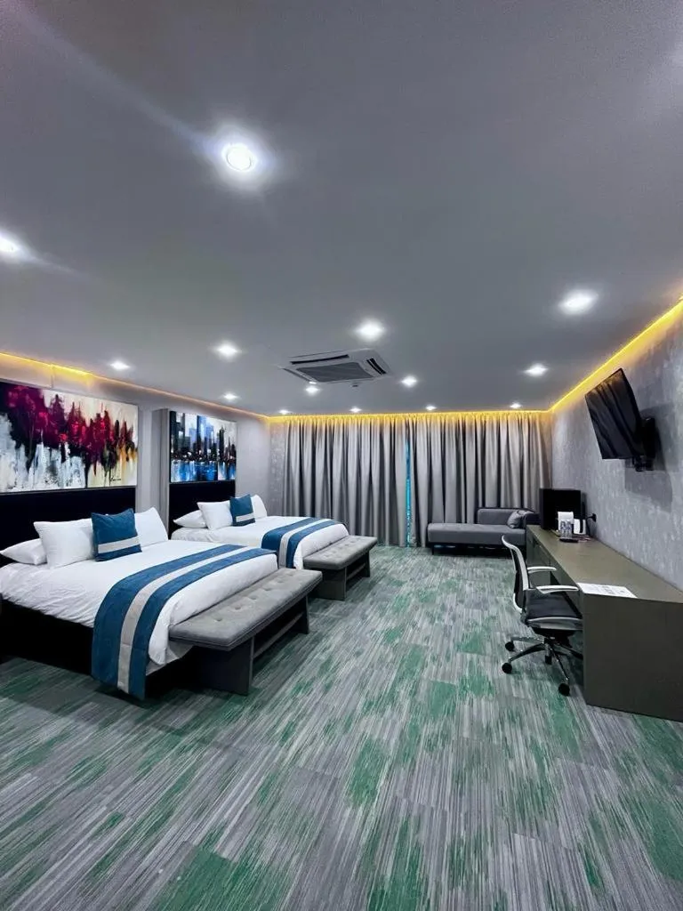 Communal lounge/ TV room, Bed in Hotel Vip La Guaira