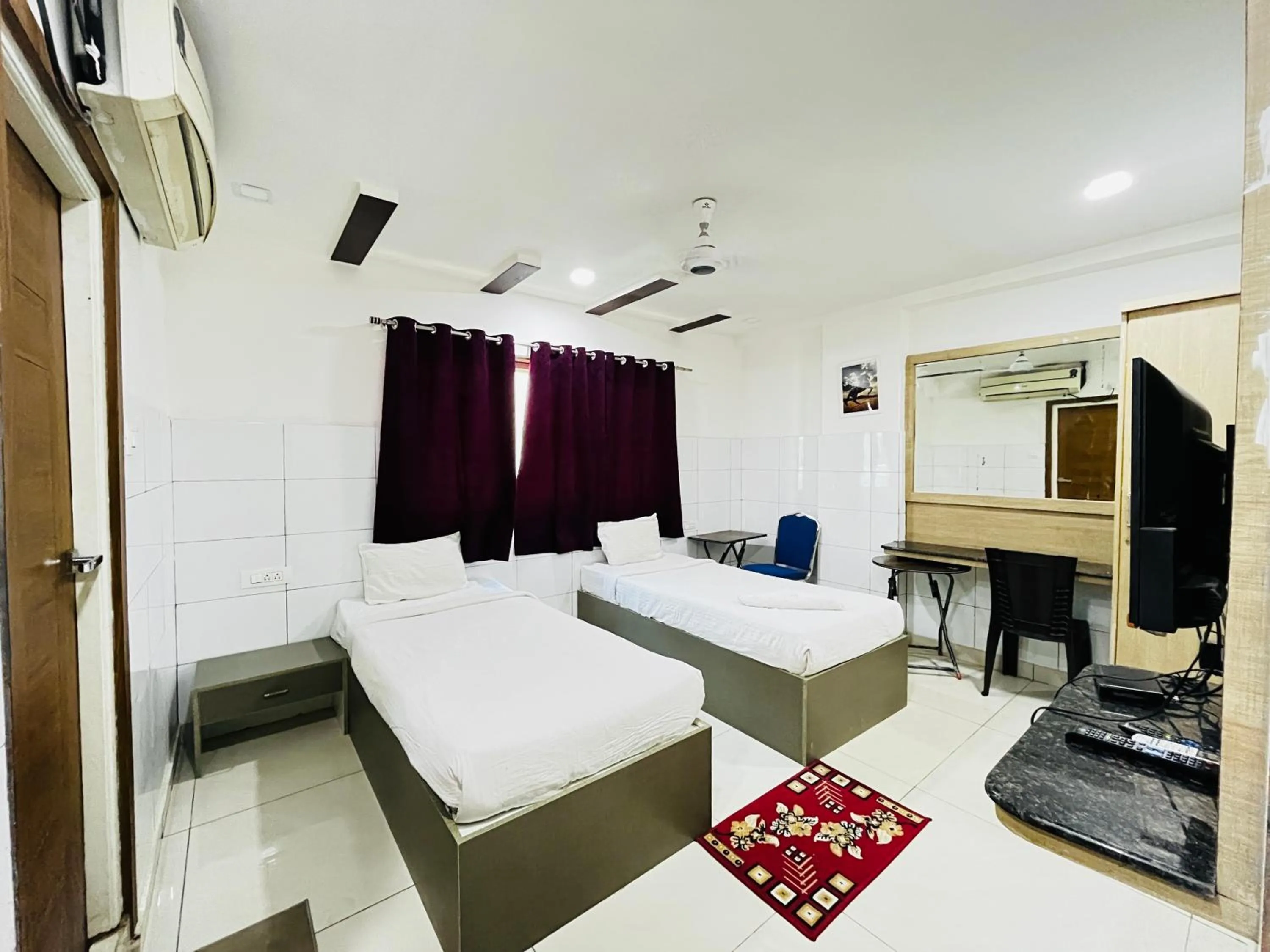 Bed in HOTEL ROYAL SUITES AND ROOMS Near AIG Hospital Gachibowli