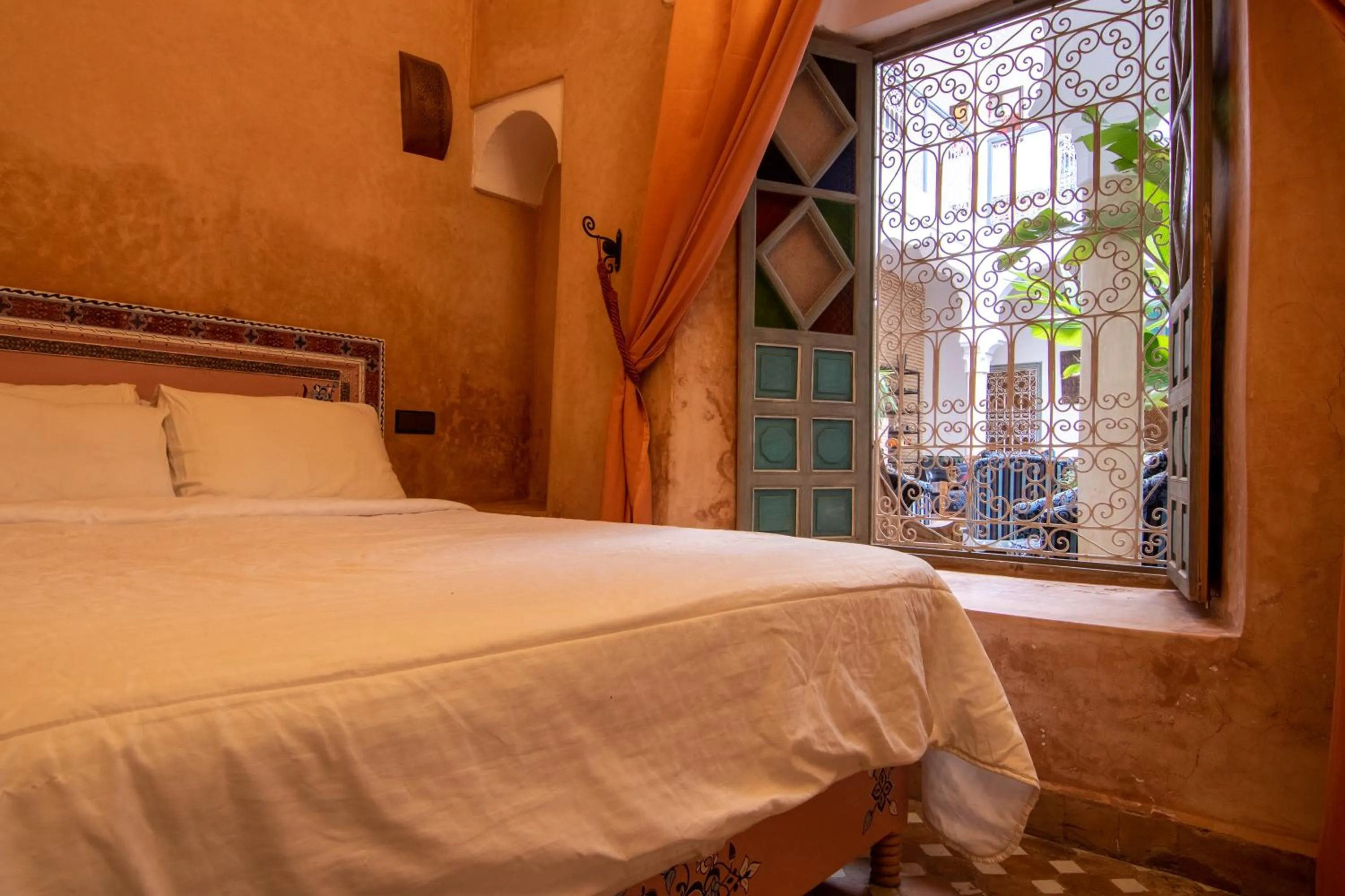 Bed in Riad Zinoun & Spa 11 Rooms