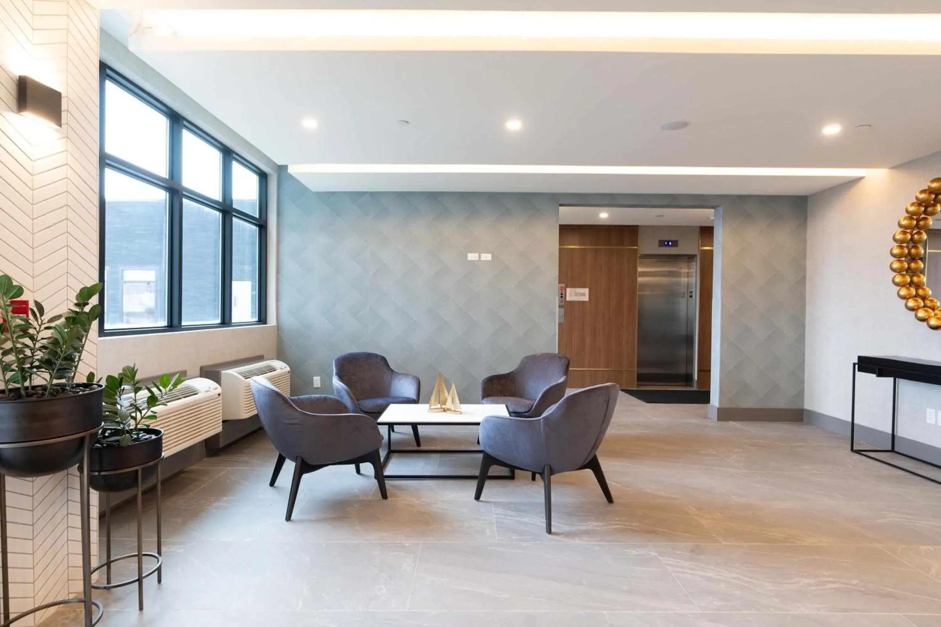 Lobby or reception in Sandman Signature Dartmouth Hotel & Suites Lobby or reception in Sandman Signature Dartmouth Hotel & Suites