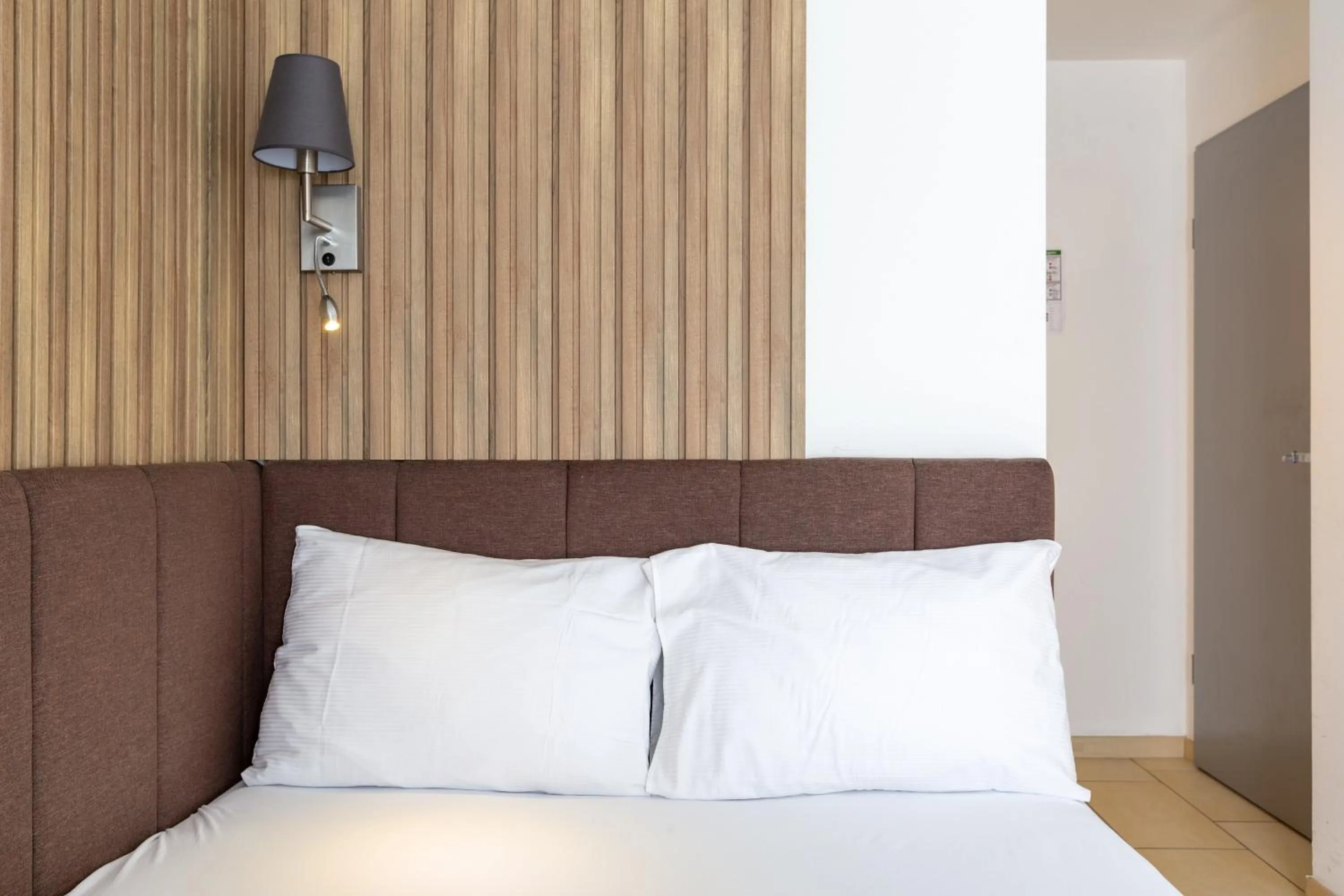 Bed in Nani City Hotel Self Check-In