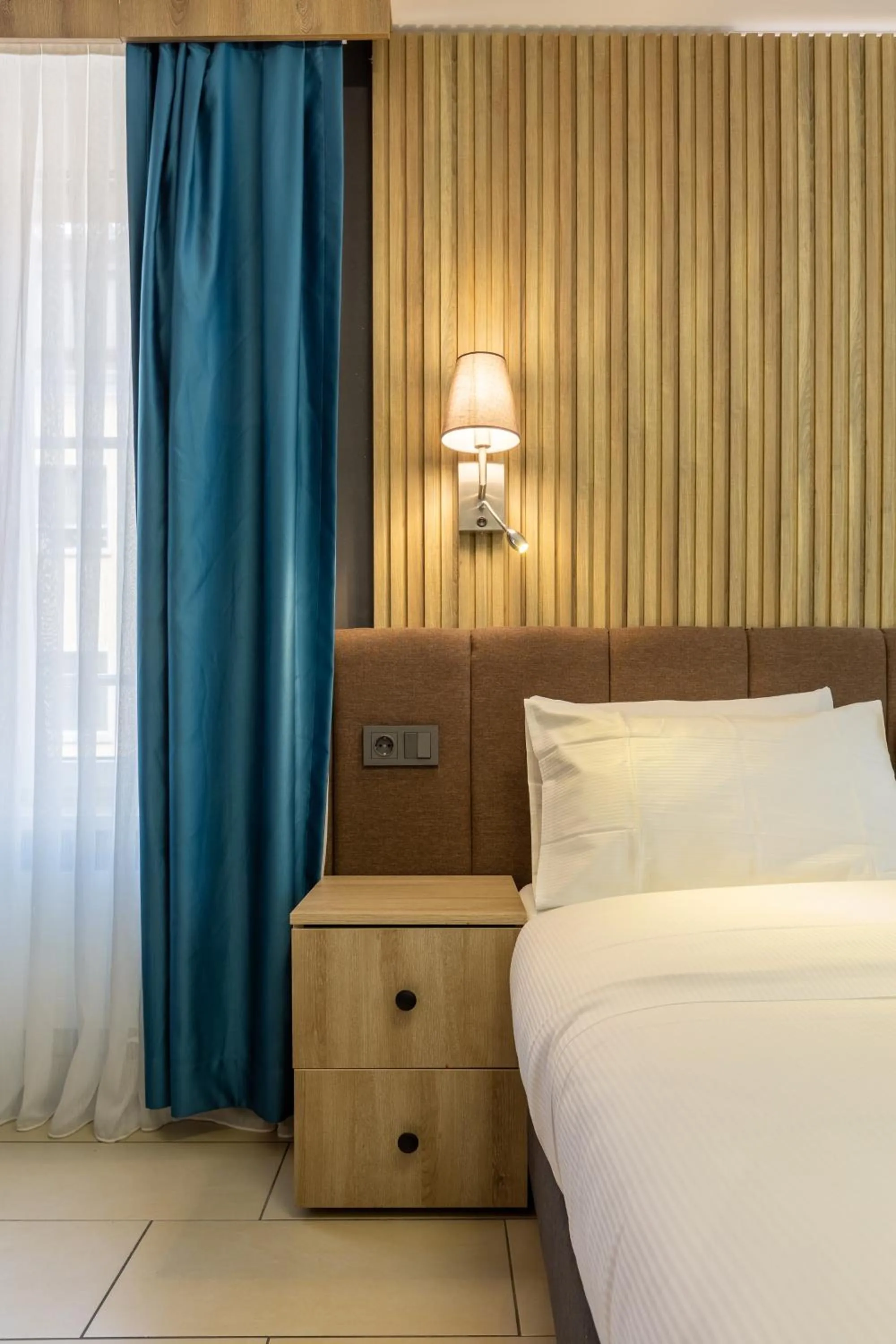 Bed in Nani City Hotel Self Check-In