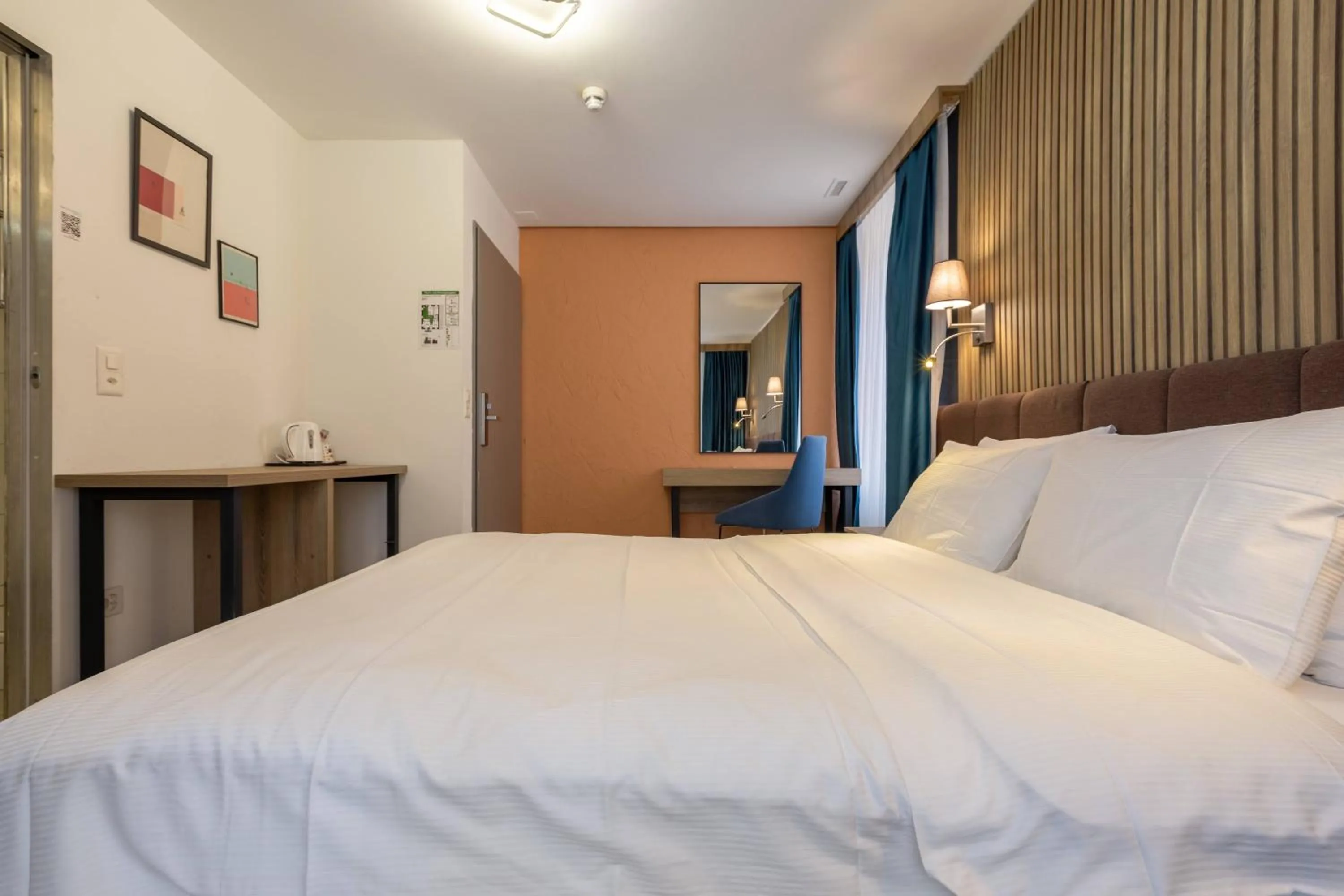 Bed in Nani City Hotel Self Check-In