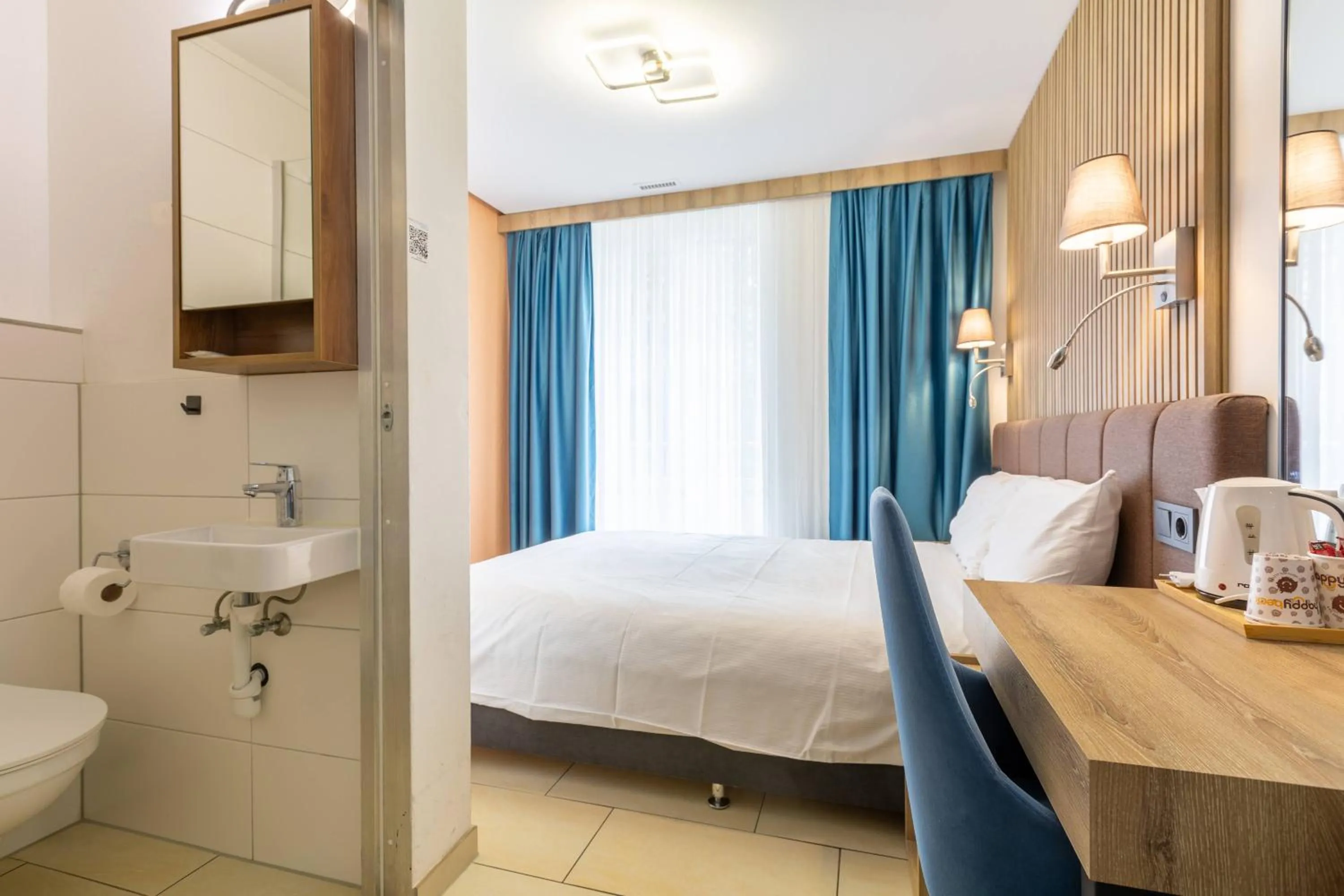 Bed in Nani City Hotel Self Check-In