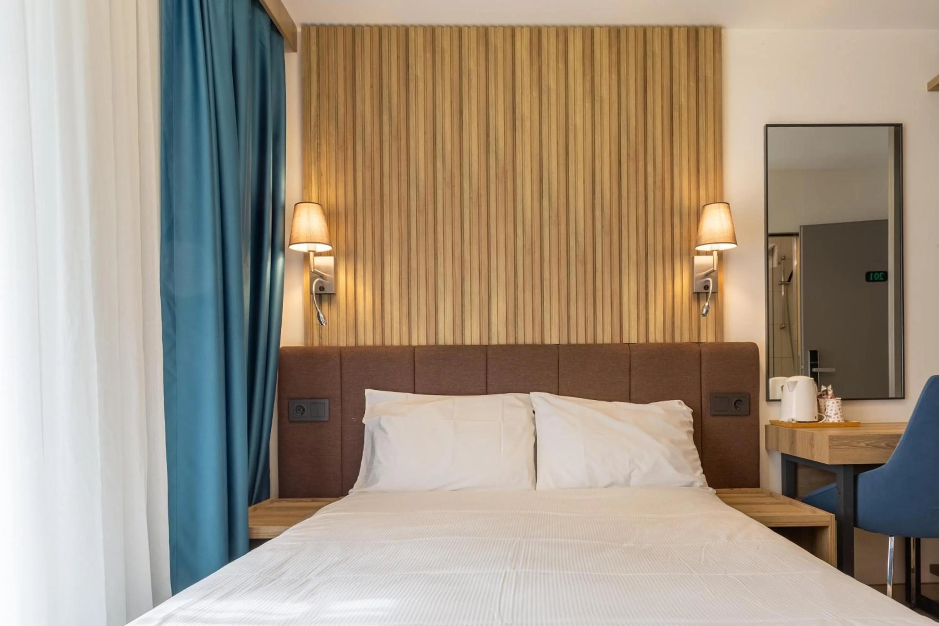 Bed in Nani City Hotel Self Check-In