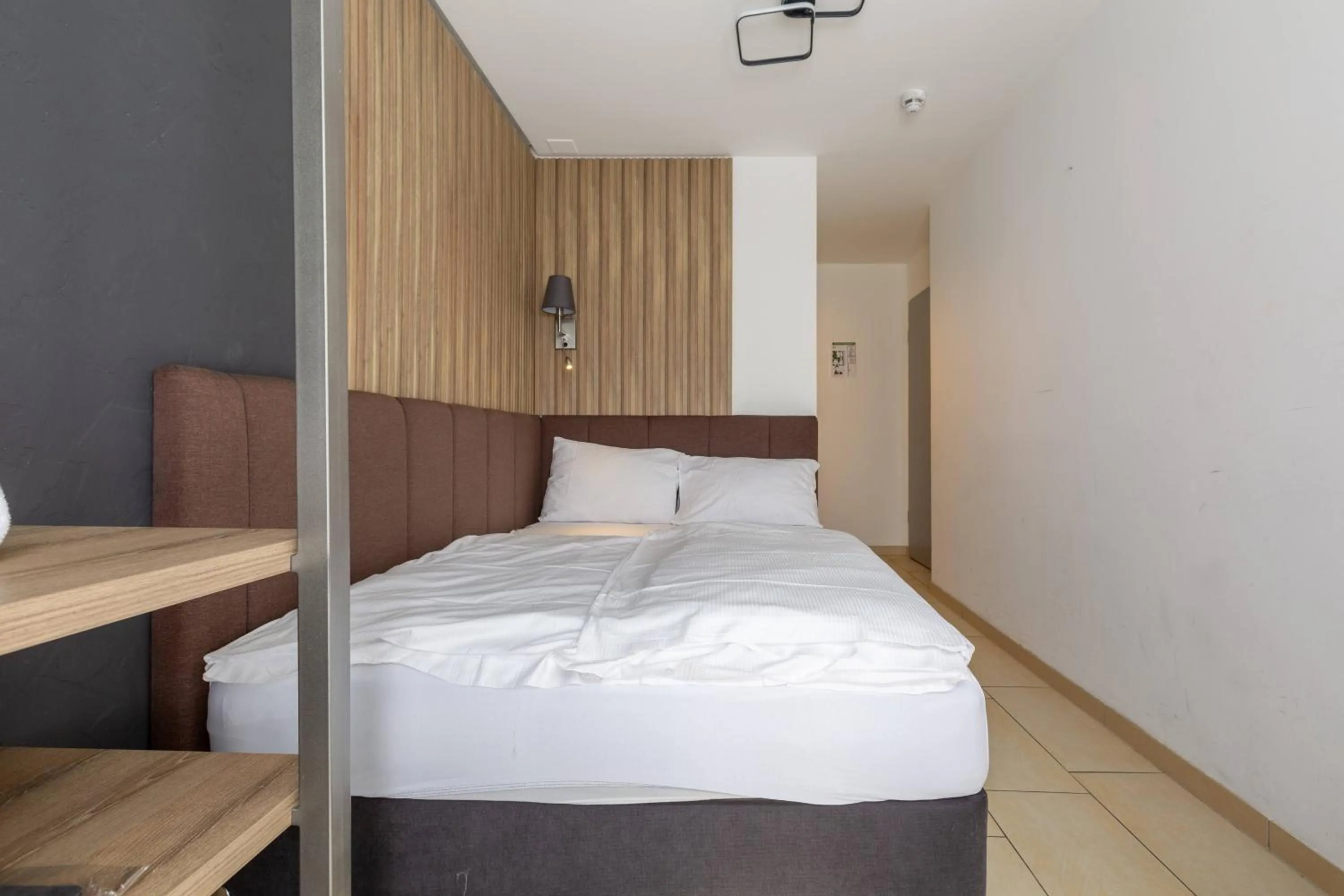 Bed in Nani City Hotel Self Check-In