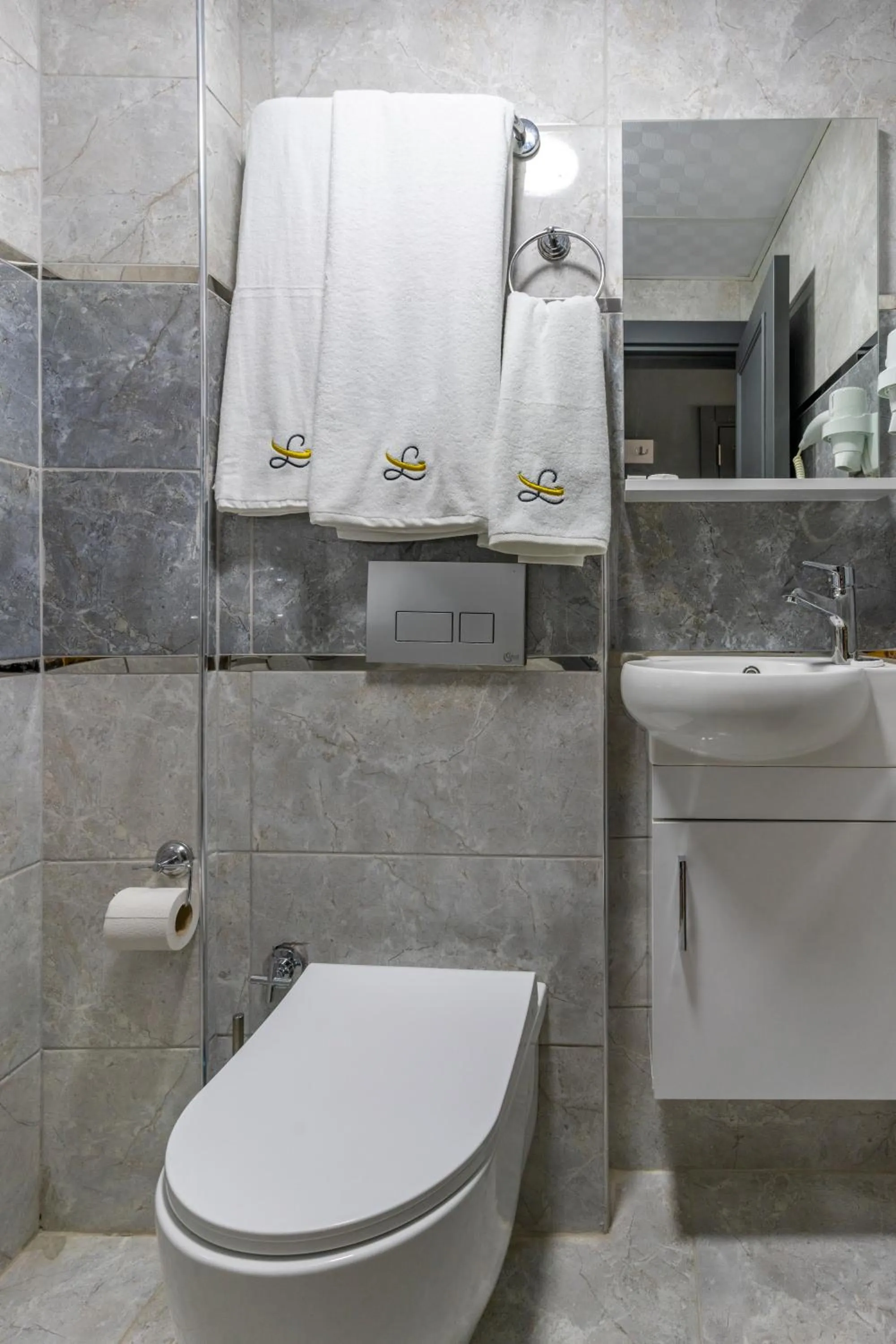 Toilet in OLSEN HOTELS