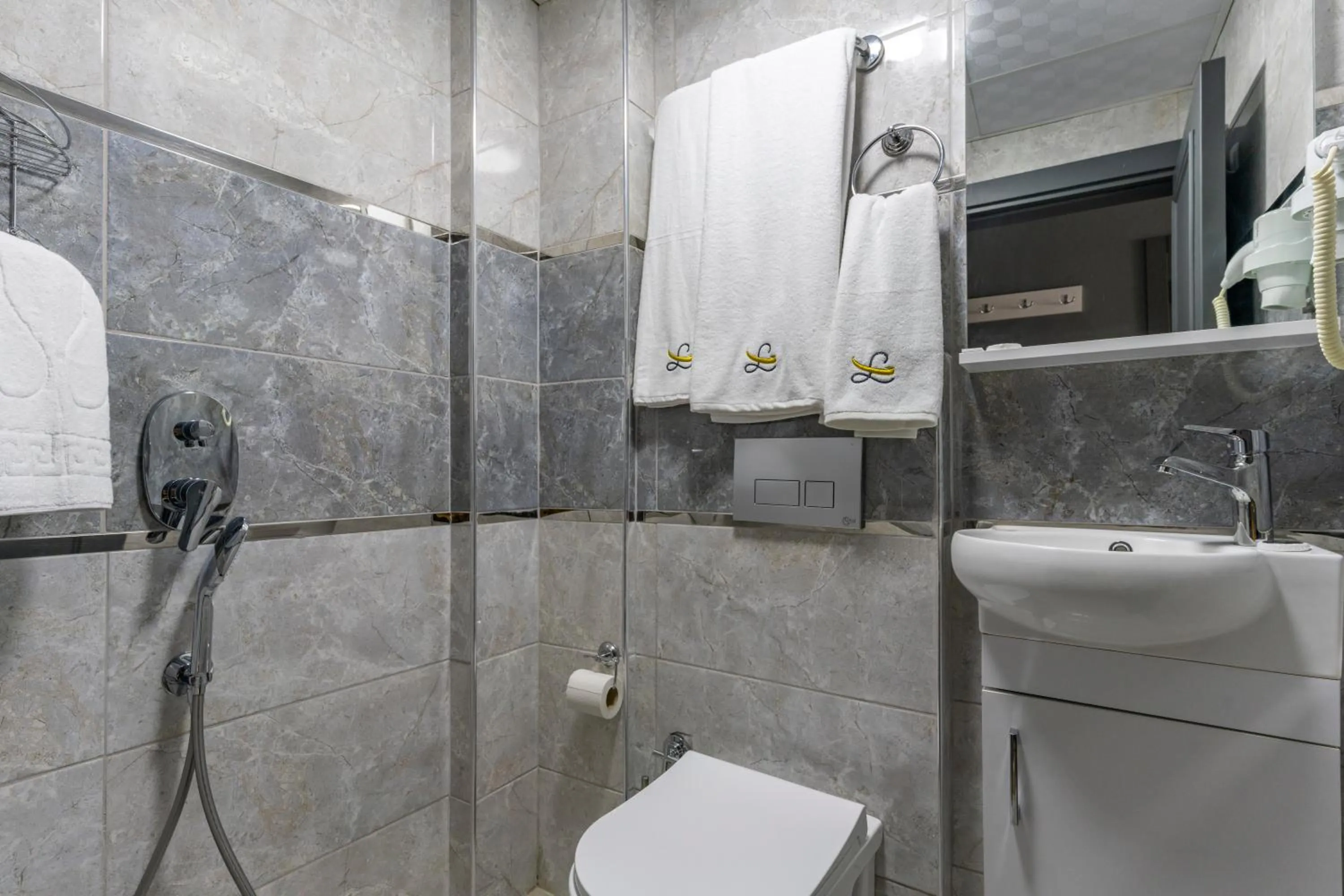 Shower in OLSEN HOTELS