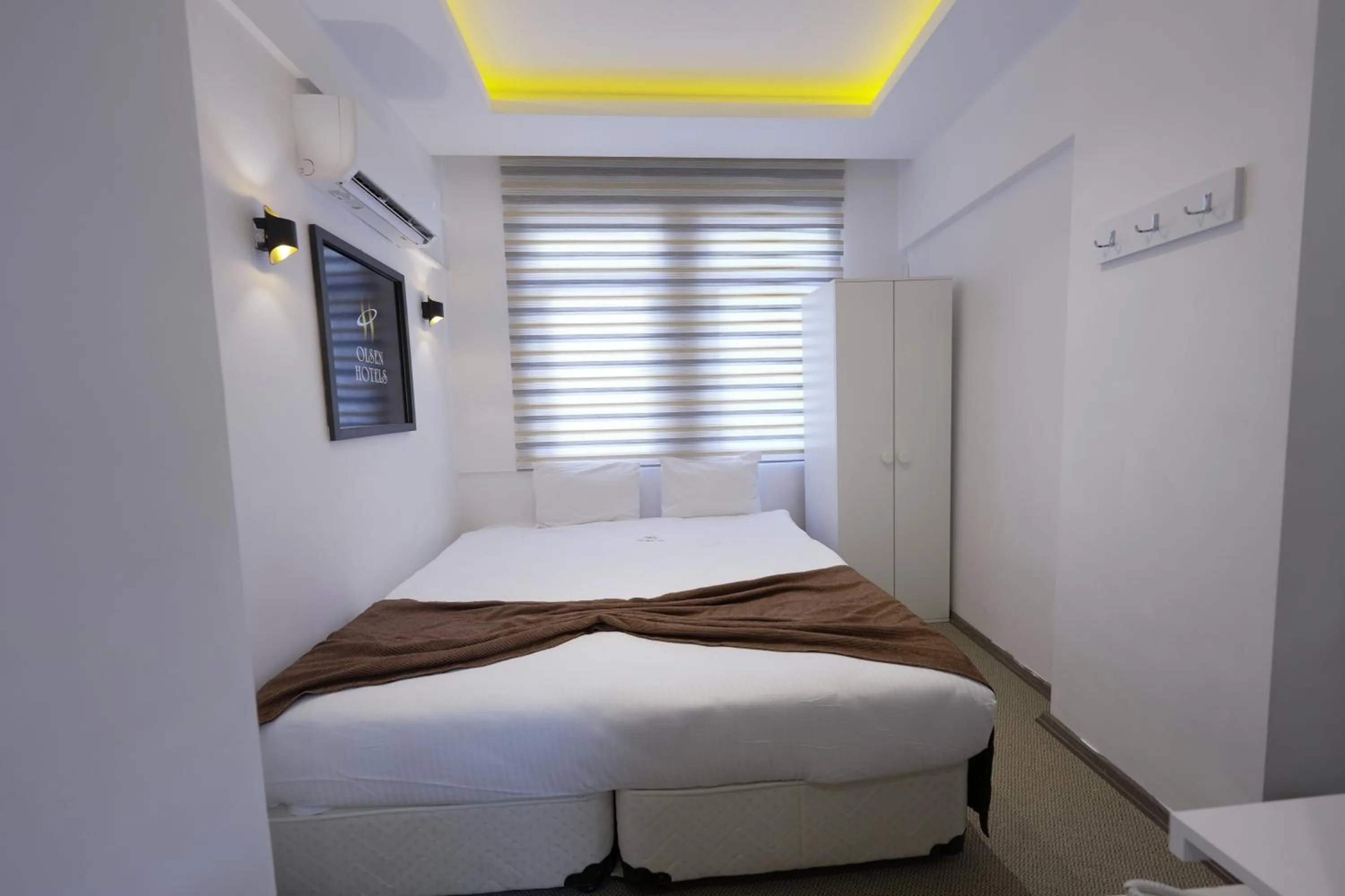 Bedroom in OLSEN HOTELS