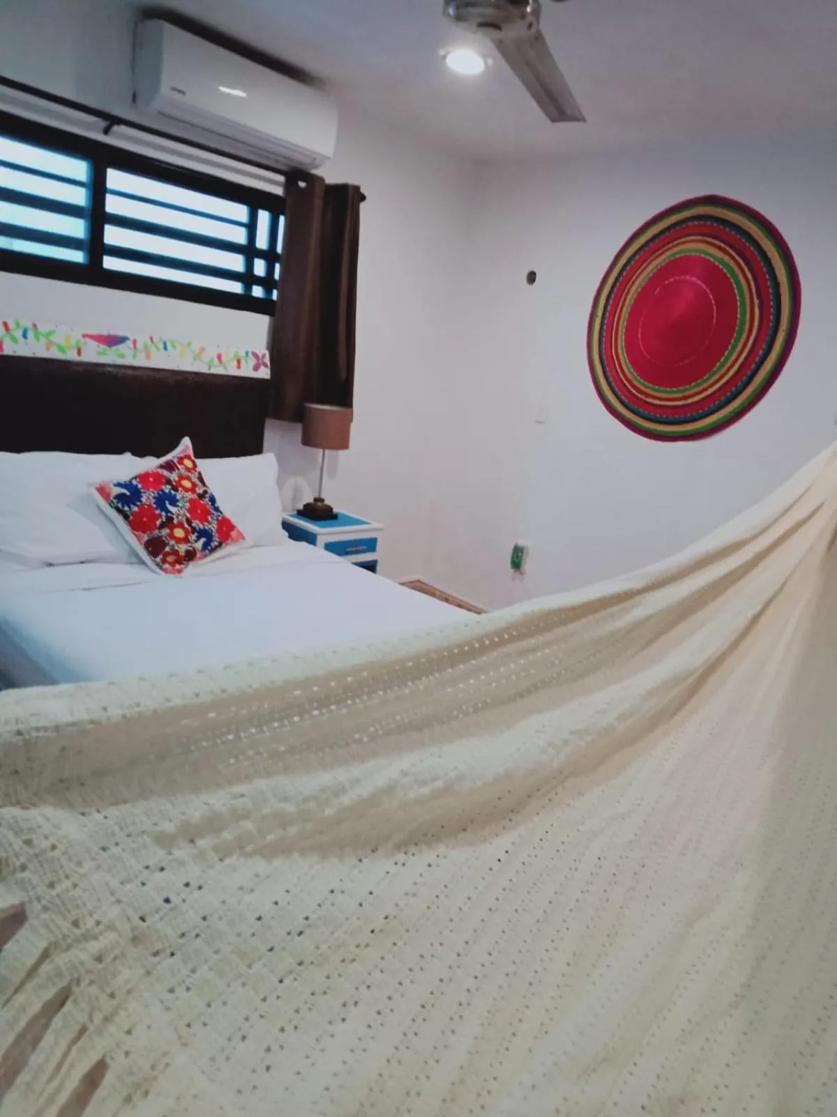 Bed in T´úubul K´iin Bed & Breakfast