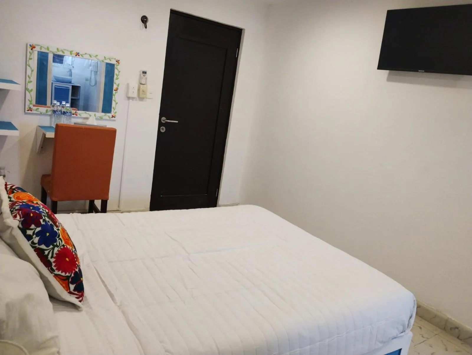 Bed in T´úubul K´iin Bed & Breakfast