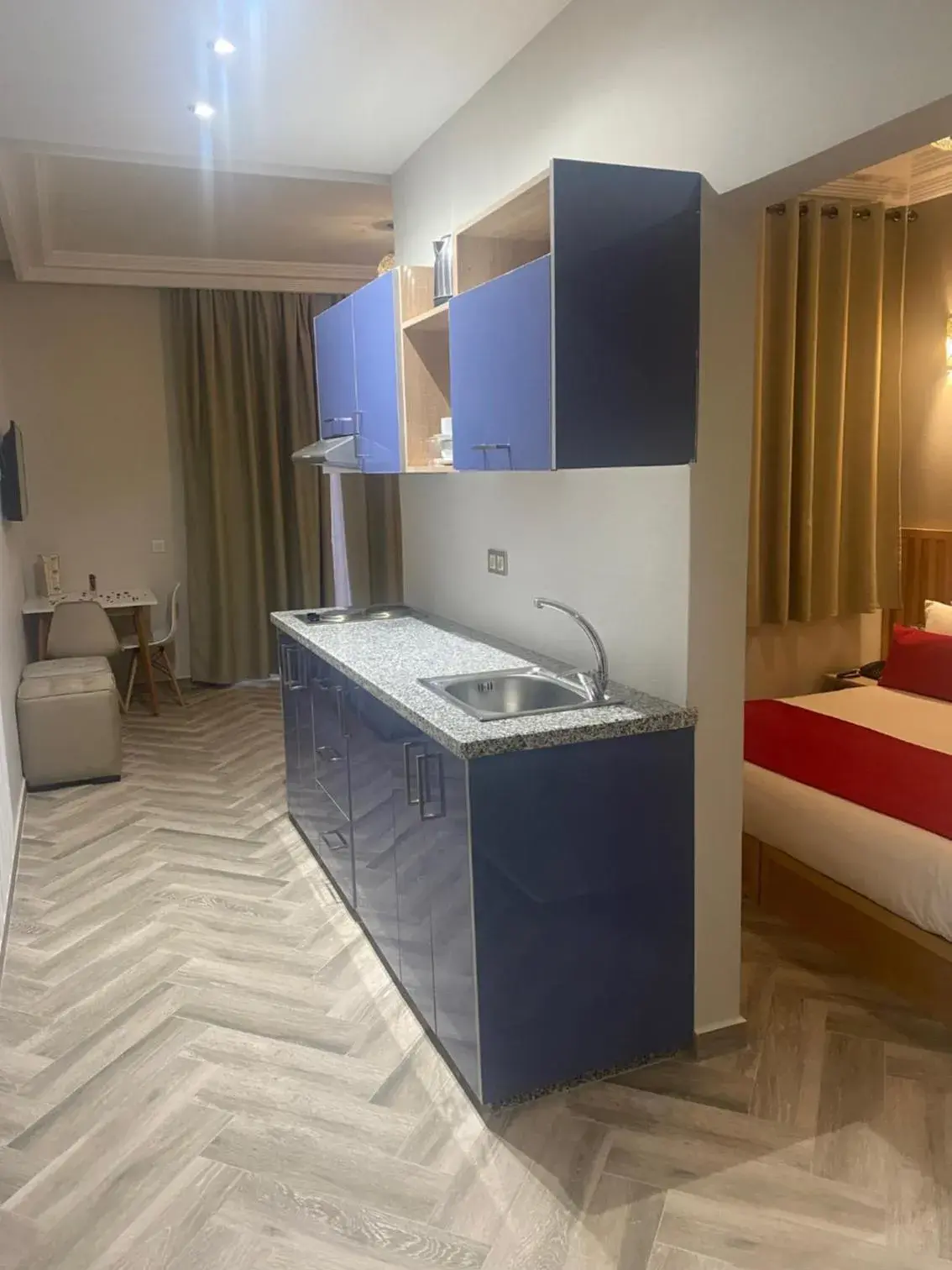 Kitchen or kitchenette, Bed in Golden Beach Appart'hotel Kitchen or kitchenette, Bed in Golden Beach Appart'hotel