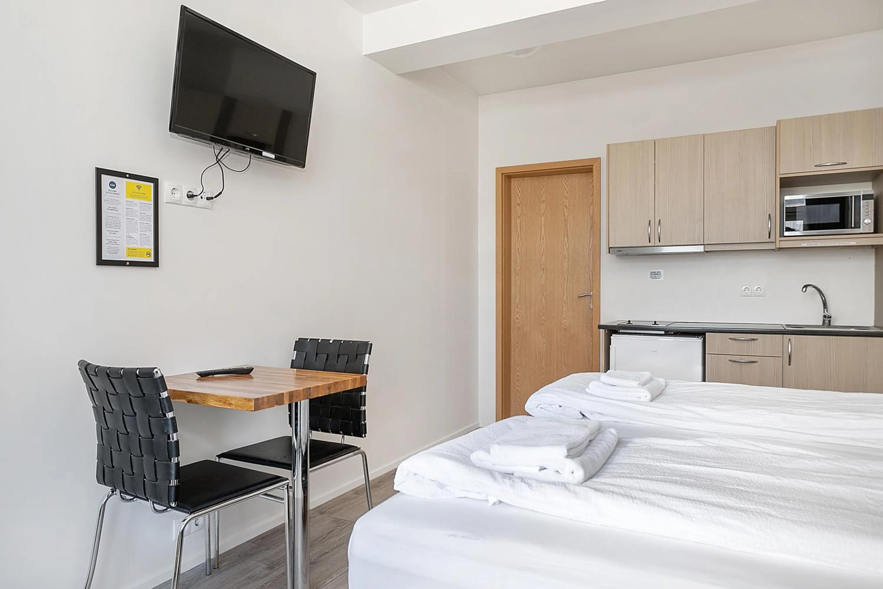 TV and multimedia, Bed in Stay Apartments Einholt