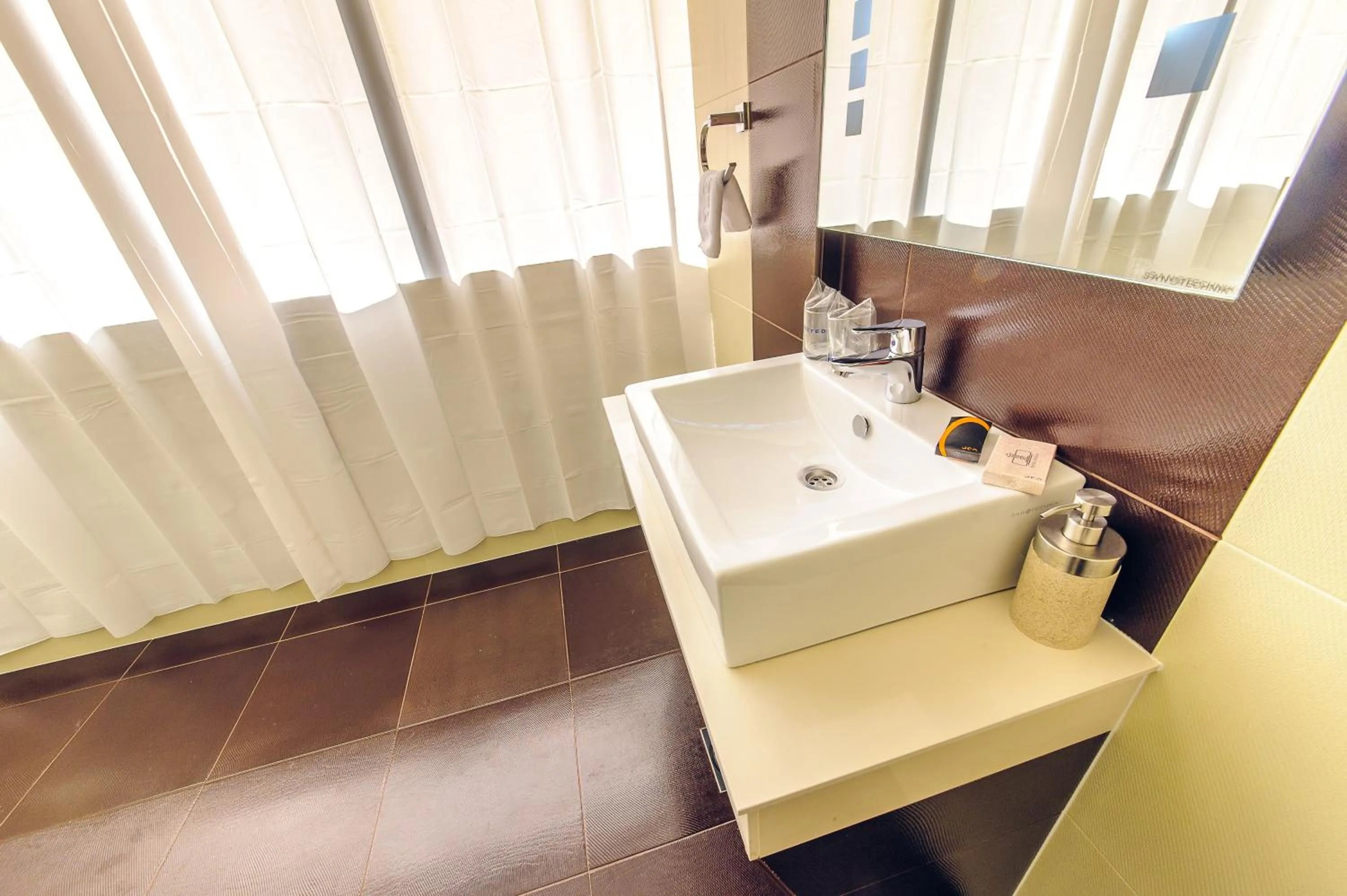 Bathroom in Philia Hotel