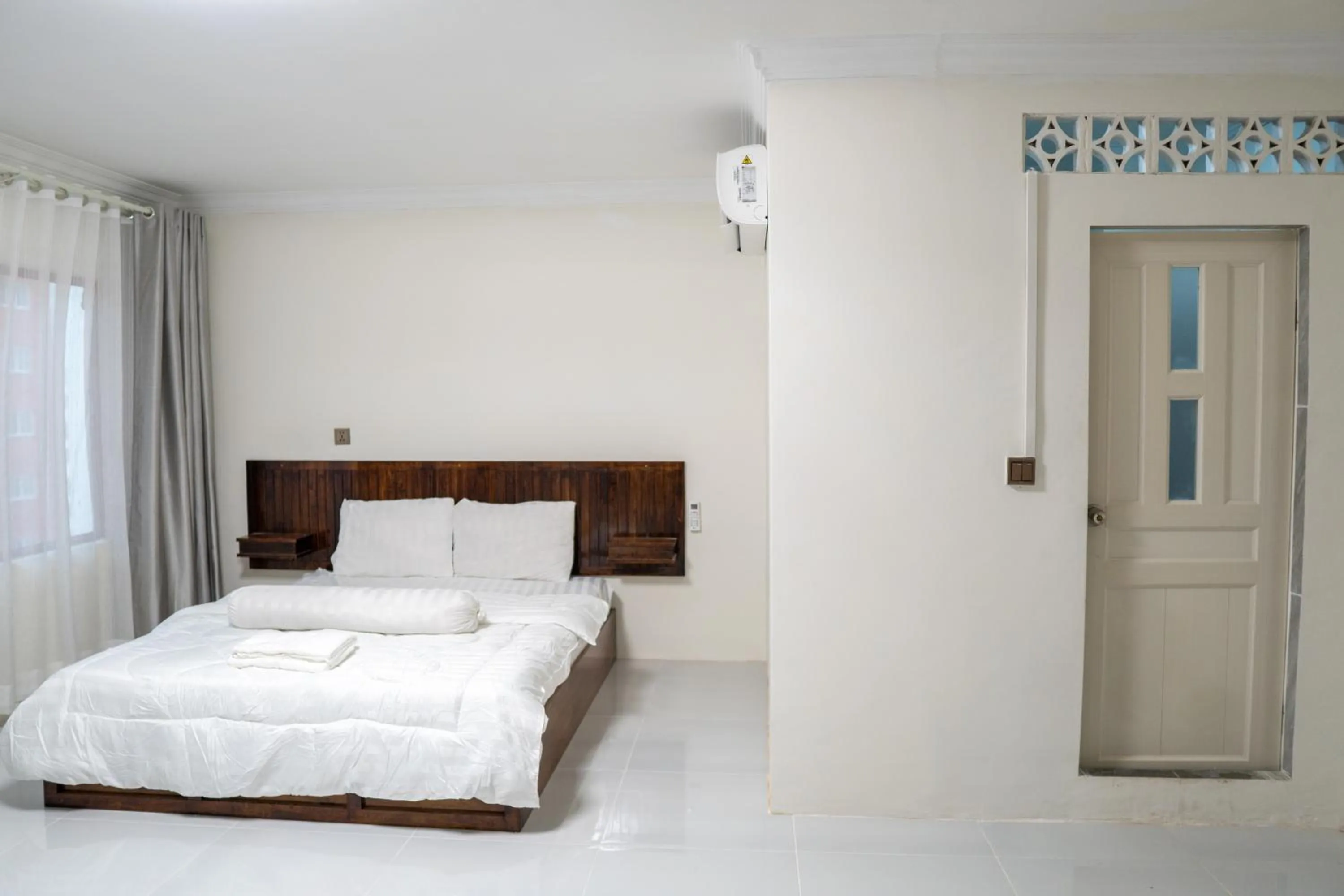 Bed in Empire House, Phnom Penh