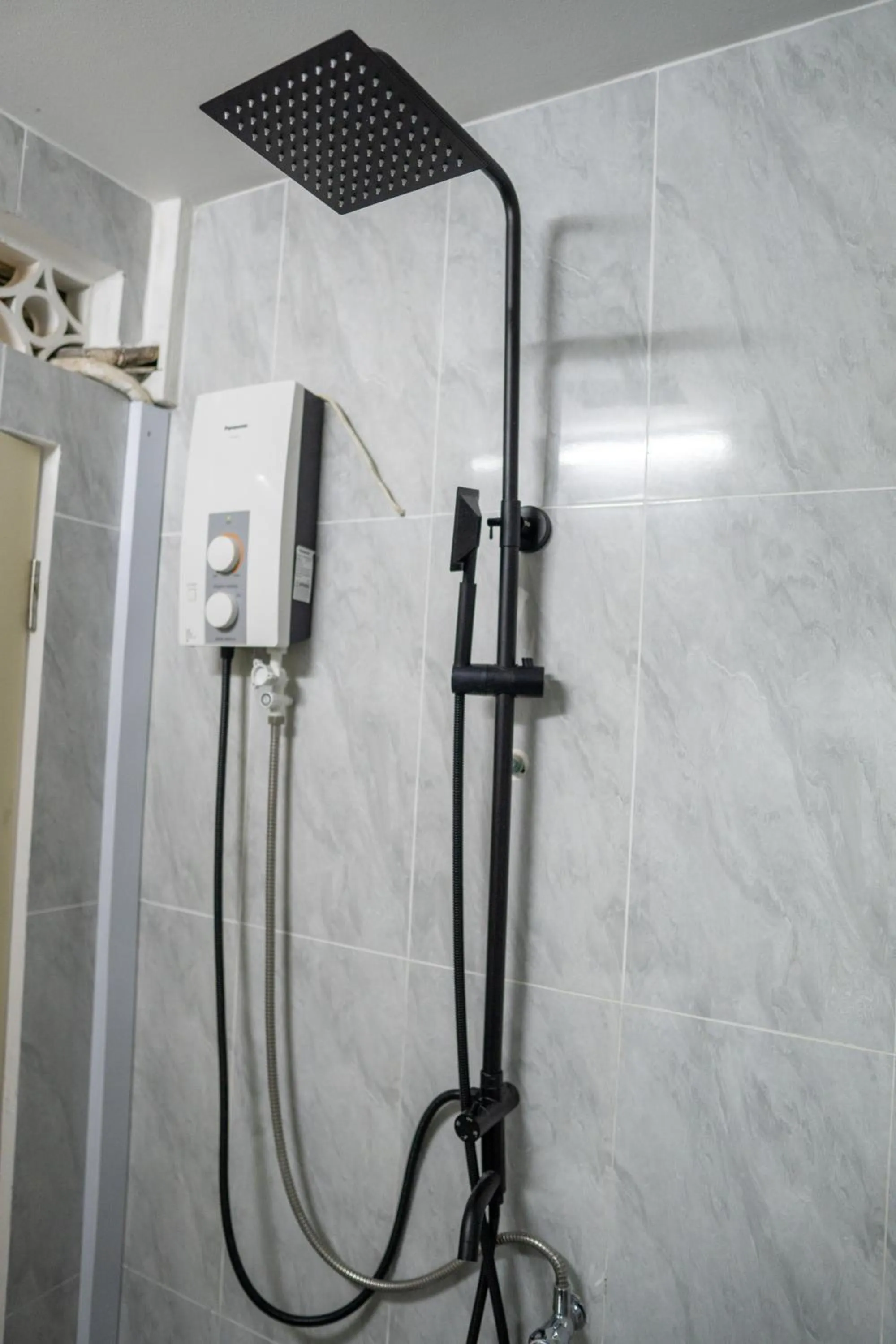 Shower in Empire House, Phnom Penh