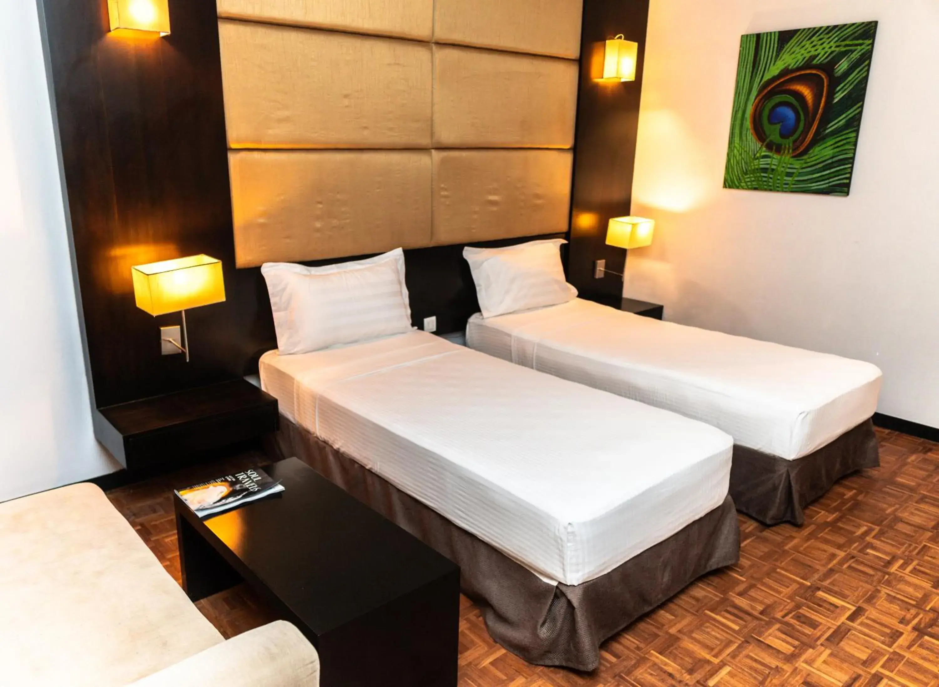 Bed in Peacock Beach Resort and Spa Bed in Peacock Beach Resort and Spa