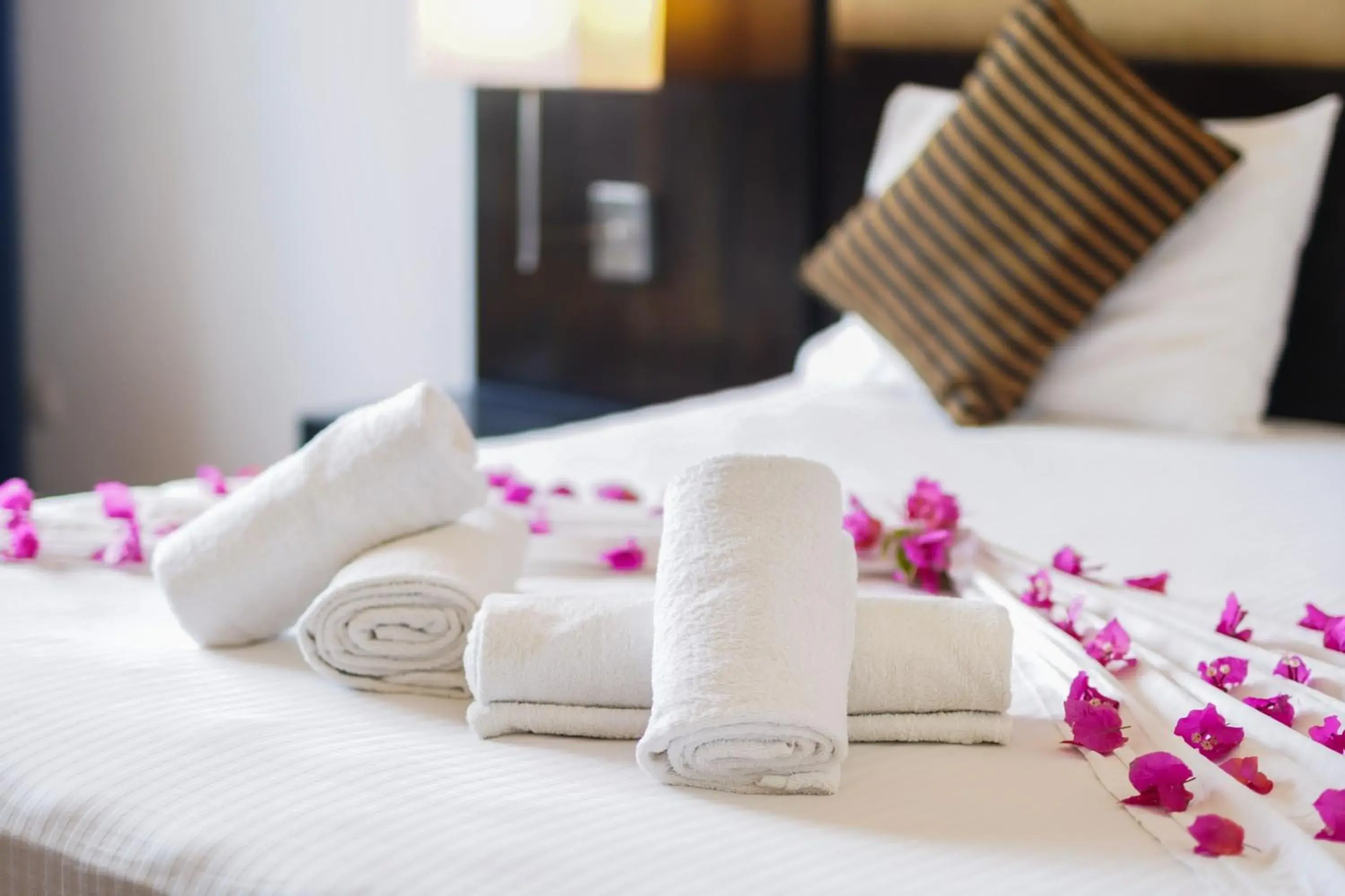 Bed in Peacock Beach Resort and Spa Bed in Peacock Beach Resort and Spa