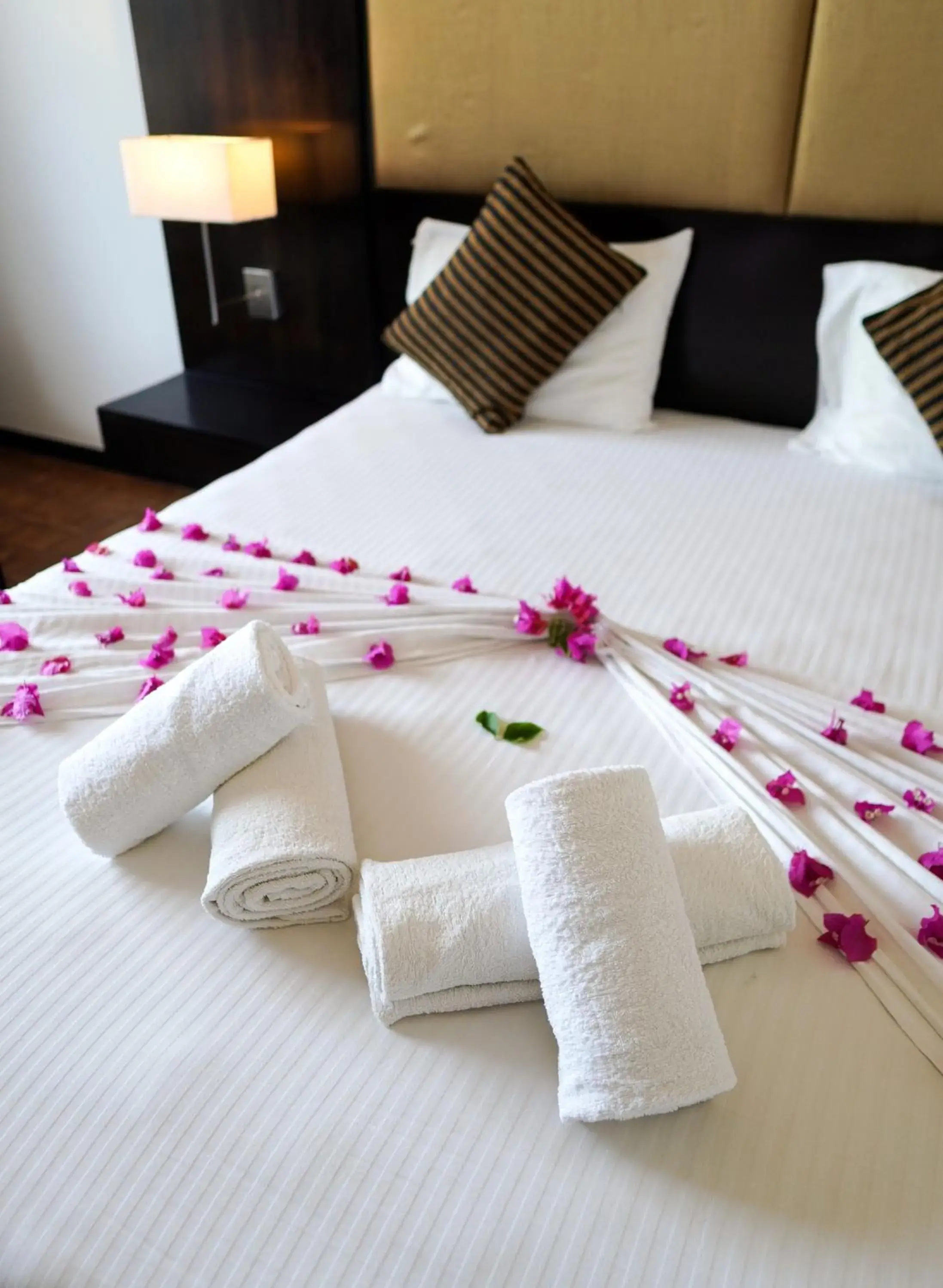 Bed in Peacock Beach Resort and Spa Bed in Peacock Beach Resort and Spa