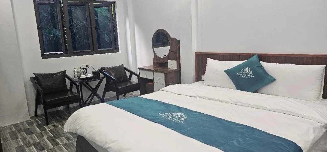 Bed in SAPA COSY HOTEL