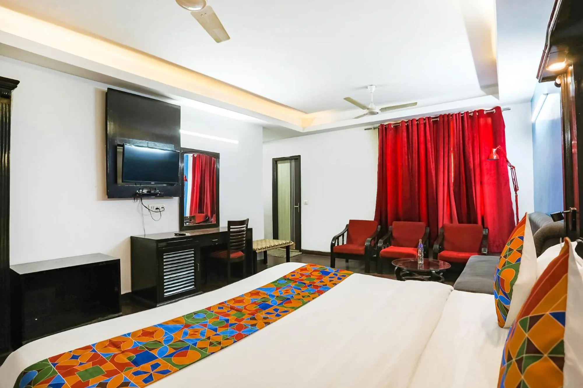 Communal lounge/ TV room, Bed in FabHotel Sentinel Suites