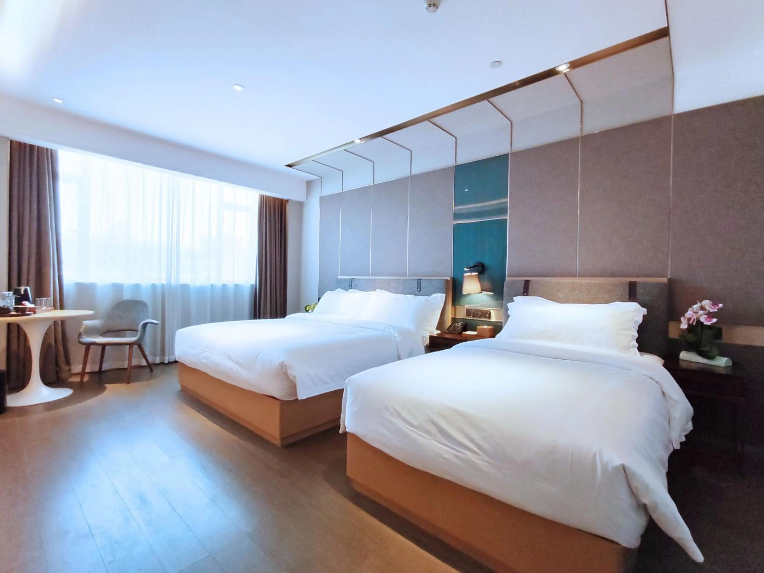 Photo of the whole room, Bed in Paco Hotel Guangzhou South Railway Station Panyu Changlong Branch
