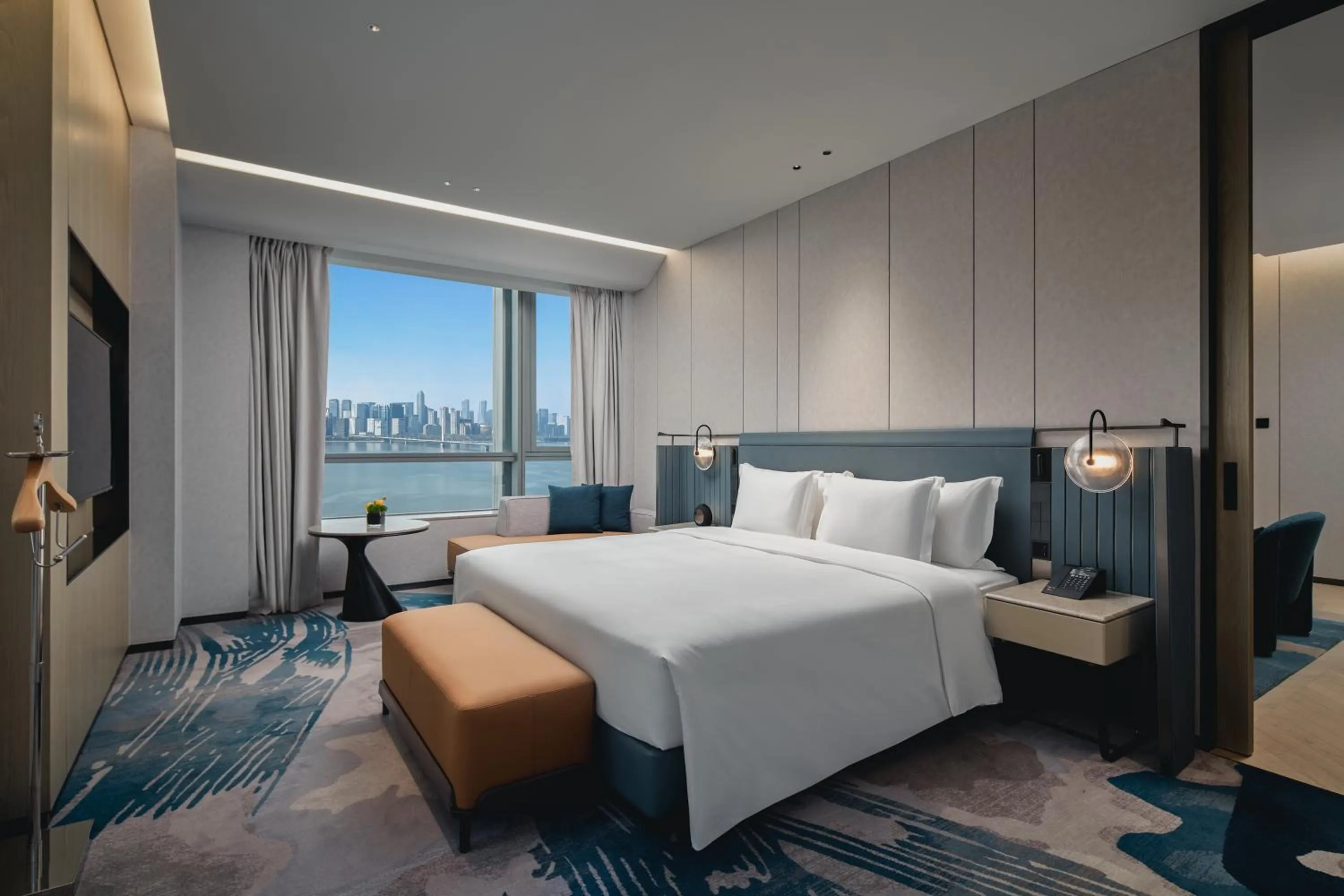 Bed in Crowne Plaza Hangzhou Riverside by IHG