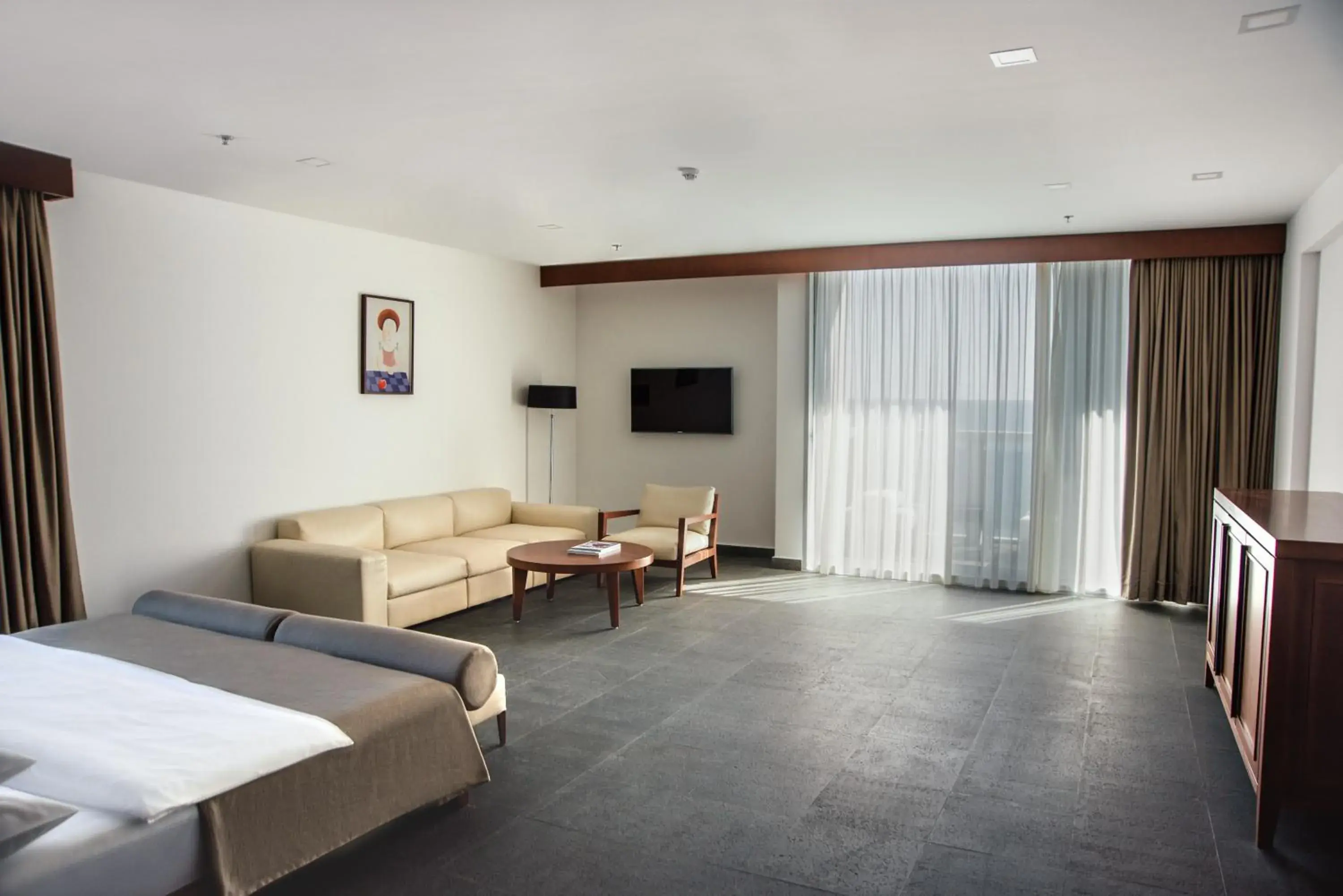 Seating area, Bed in Avala Resort & Villas Seating area, Bed in Avala Resort & Villas