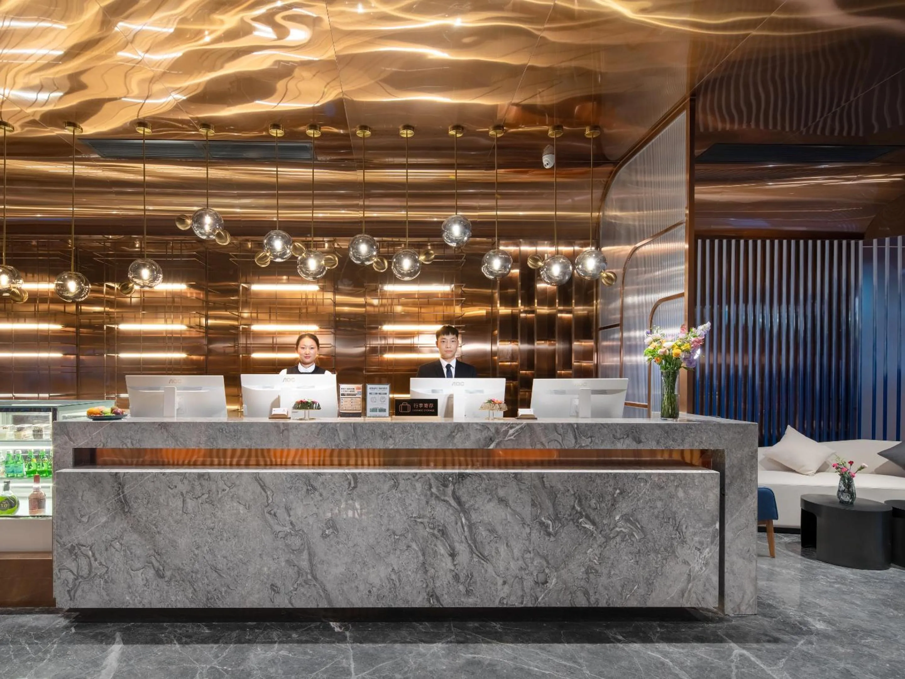 Lobby or reception in Echarm PLUS International Hotel Zhujiang New Town Wuyangcun Metro Station Branch- Free Deliver Service to Canton Fair Complex During Canton Fair Period