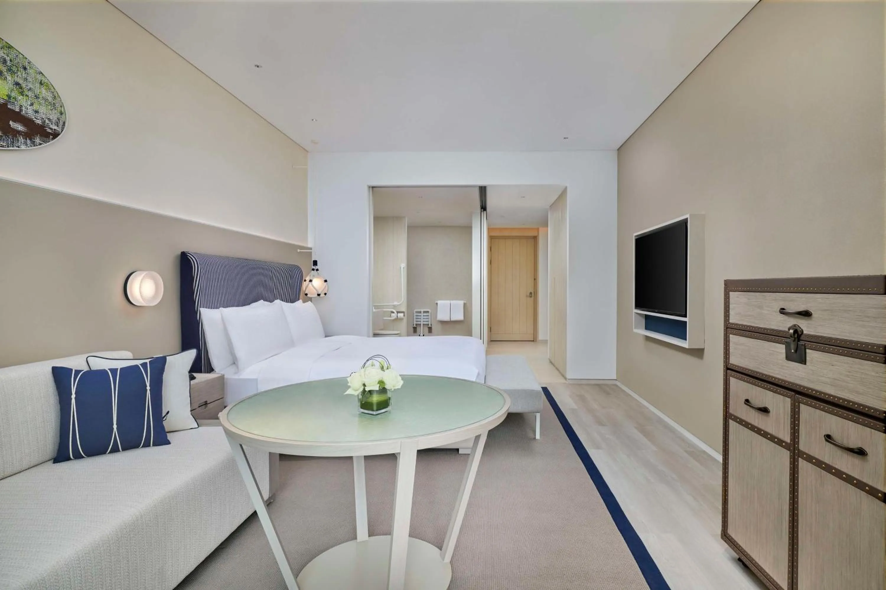 Living room in The Mermoon Resort Hainan Tufu Bay, Tapestry By Hilton