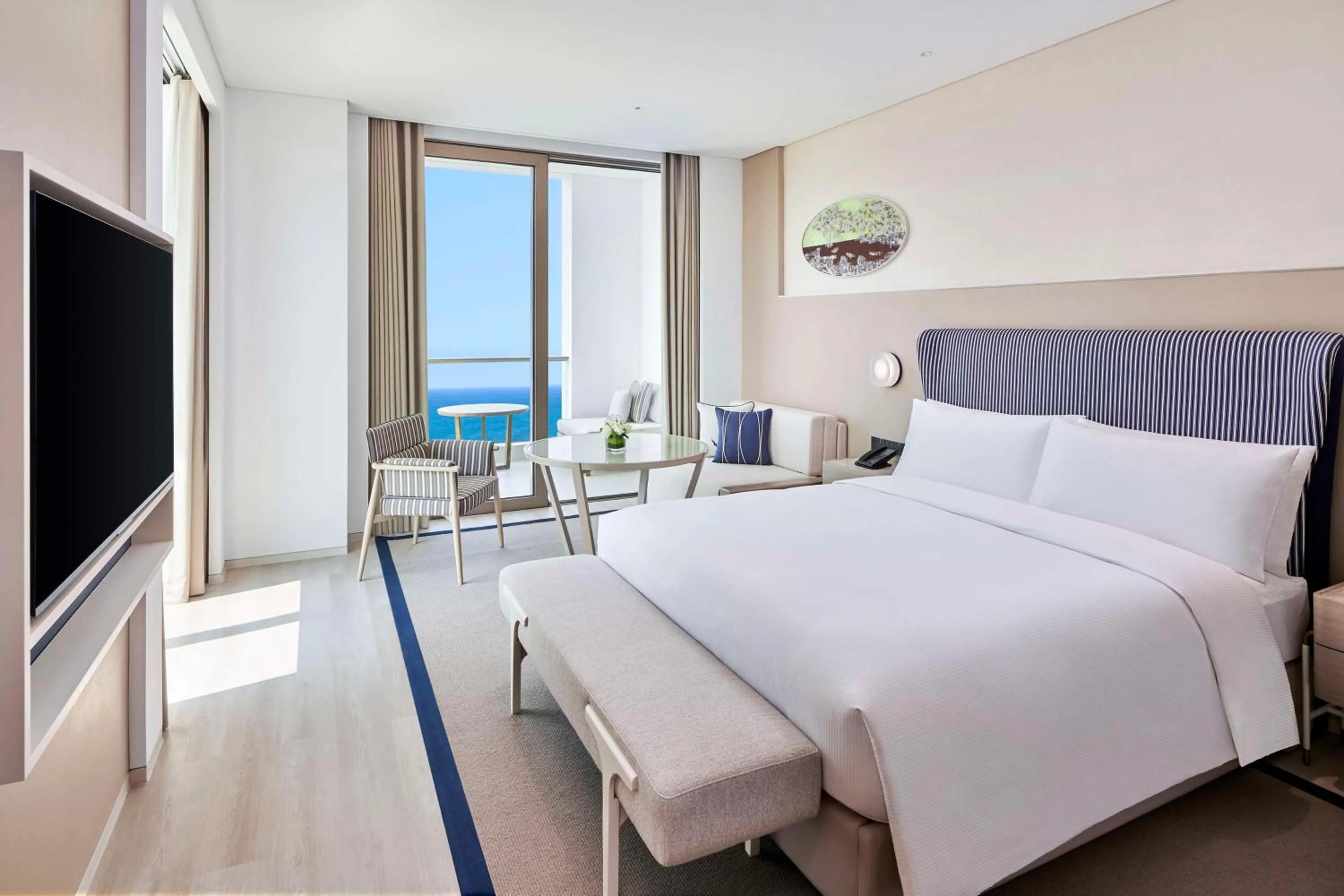 Living room, Bed in The Mermoon Resort Hainan Tufu Bay, Tapestry By Hilton